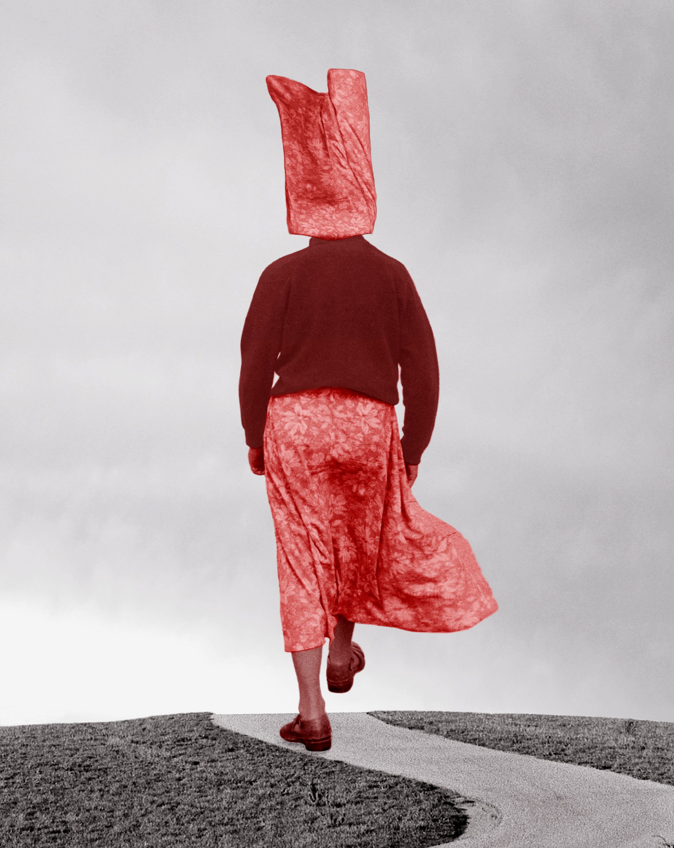 A print of a figure in a red skirt, red sweater and a red mask walking down a path in greyscale.