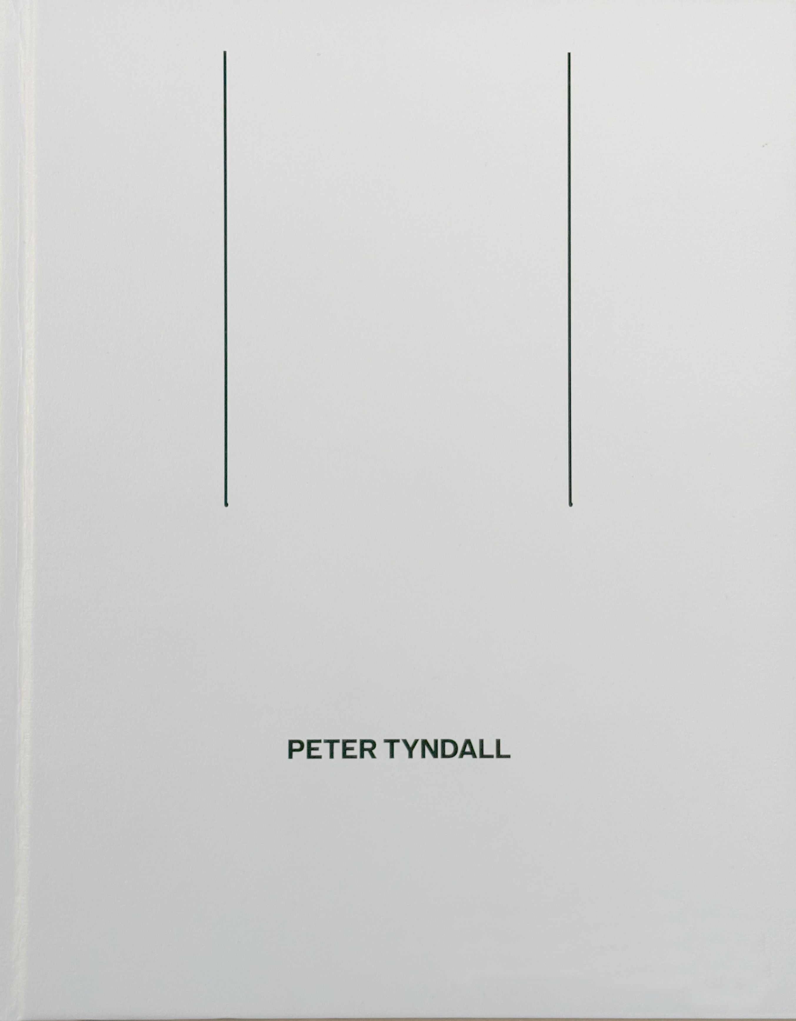 a white cover with two vertical black lines about the words Peter Tyndall in black font