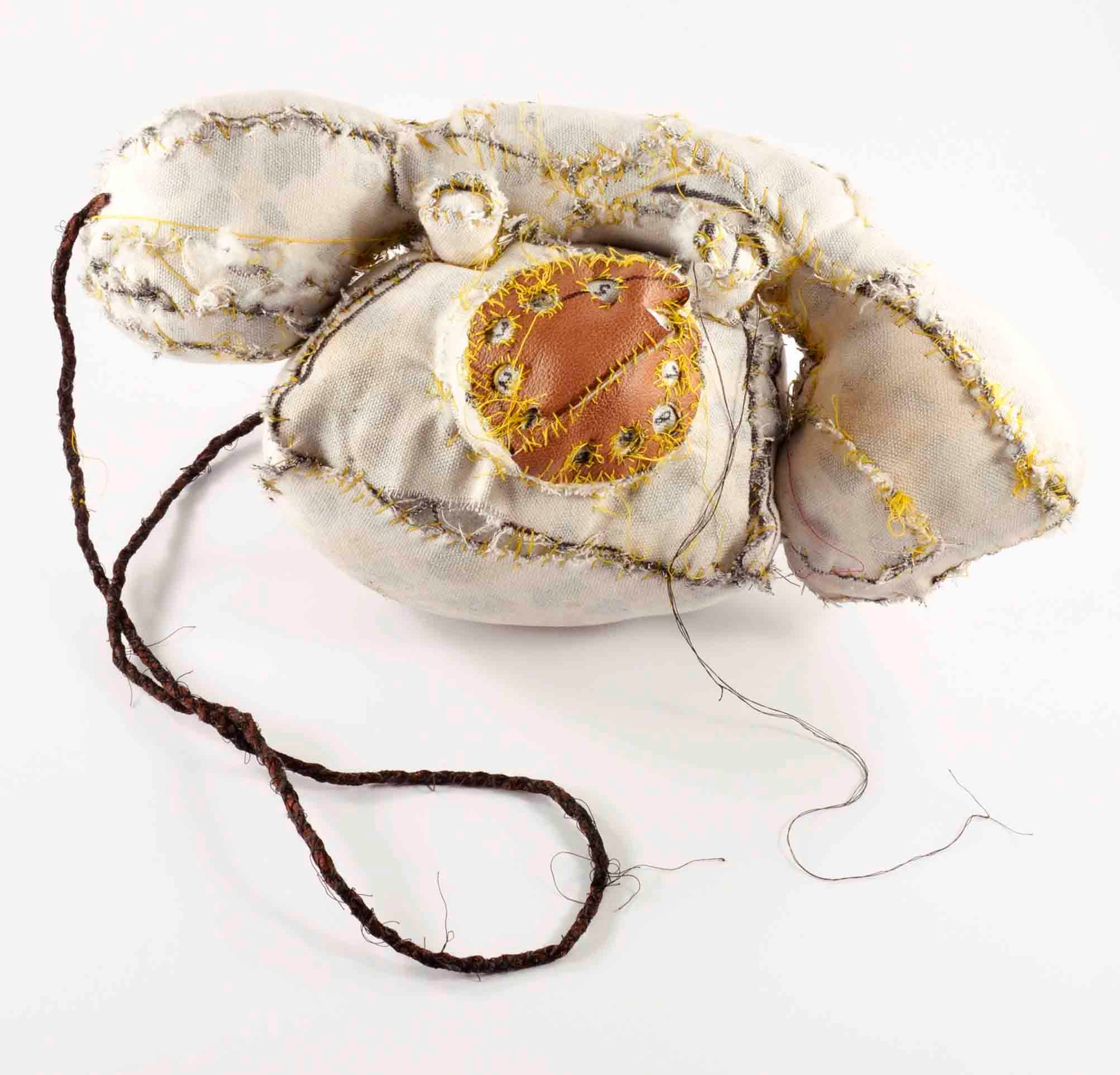 A fabric sculpture of an old-fashioned telephone 