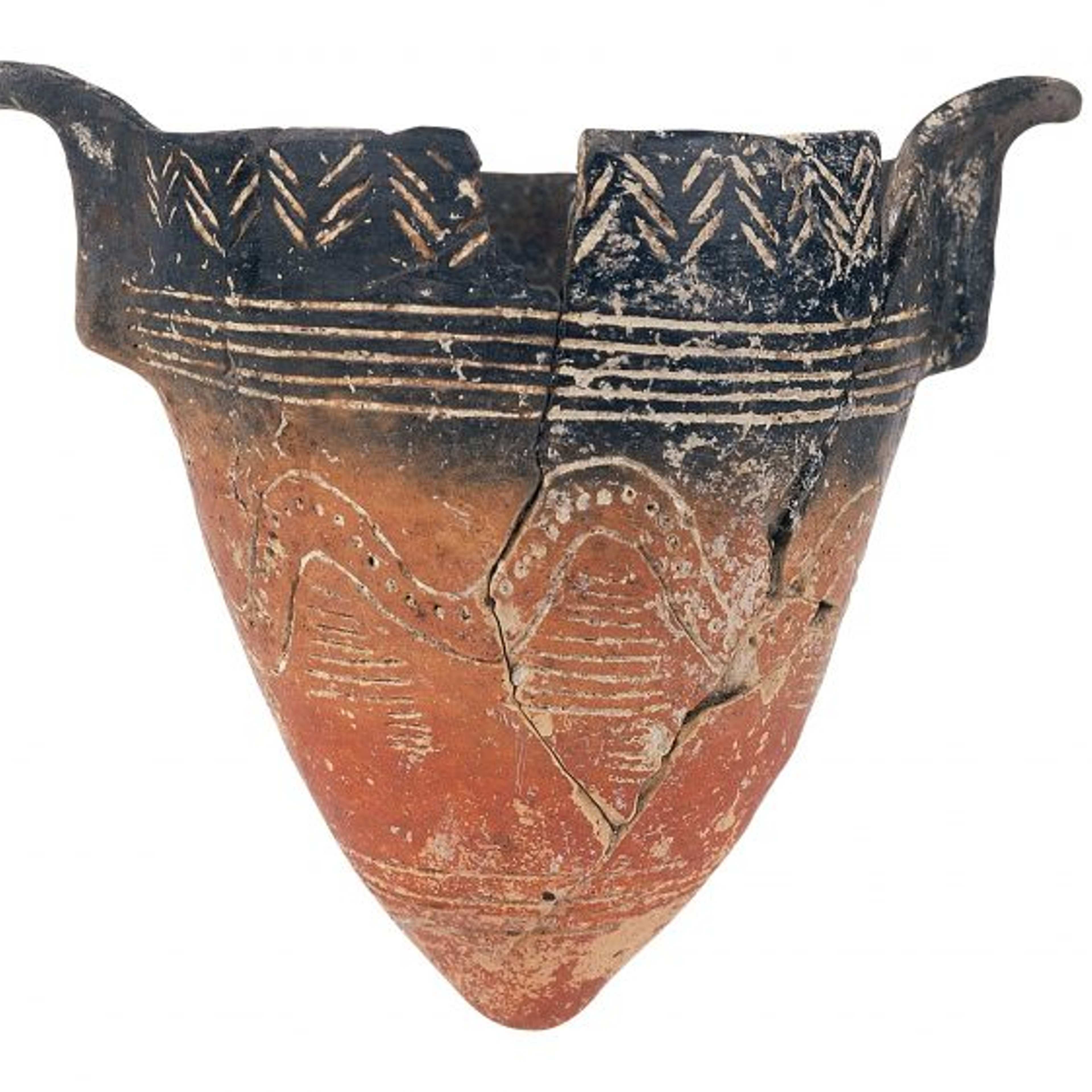 An ancient ceramic vessel of conical shape