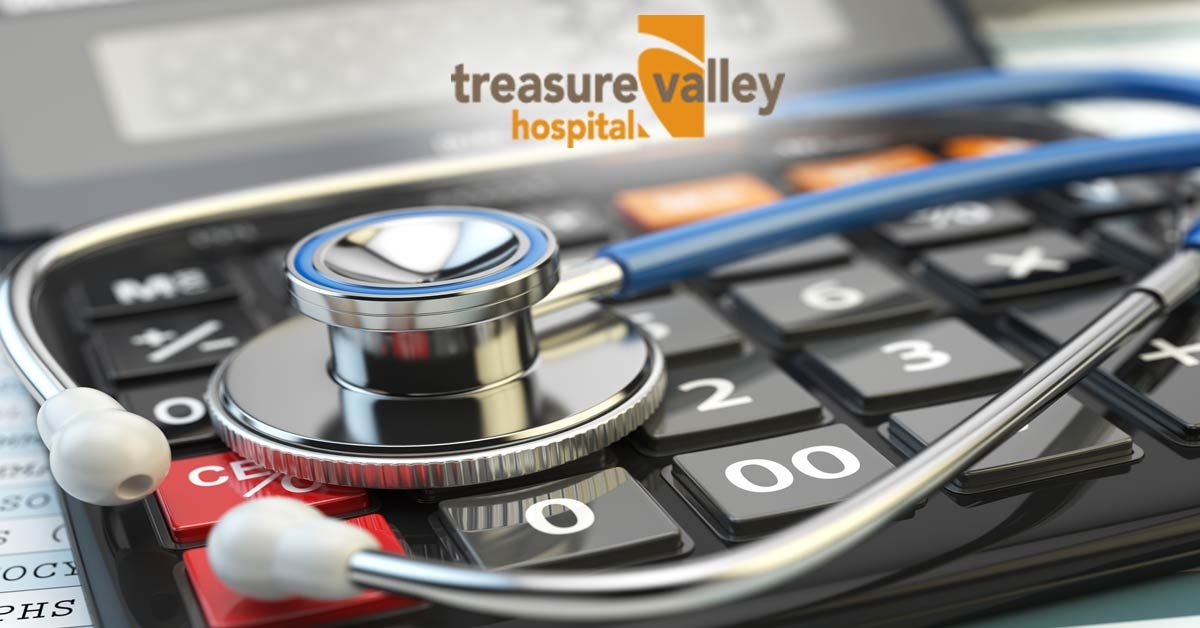 Stethoscope on top of a Calculator | Treasure Valley Hospital