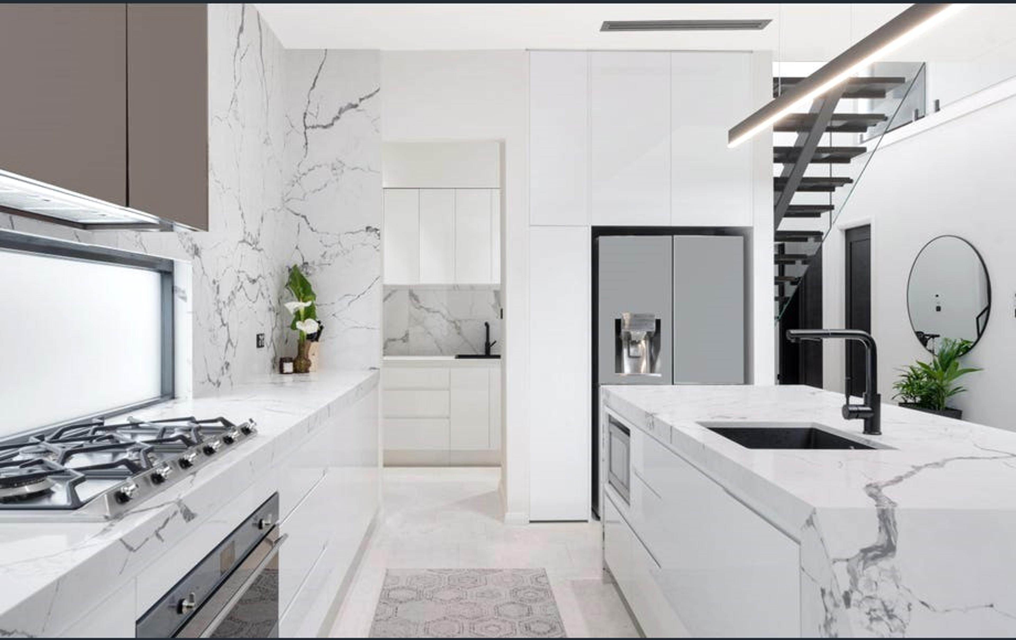 modern kitchen by Dezire Homes