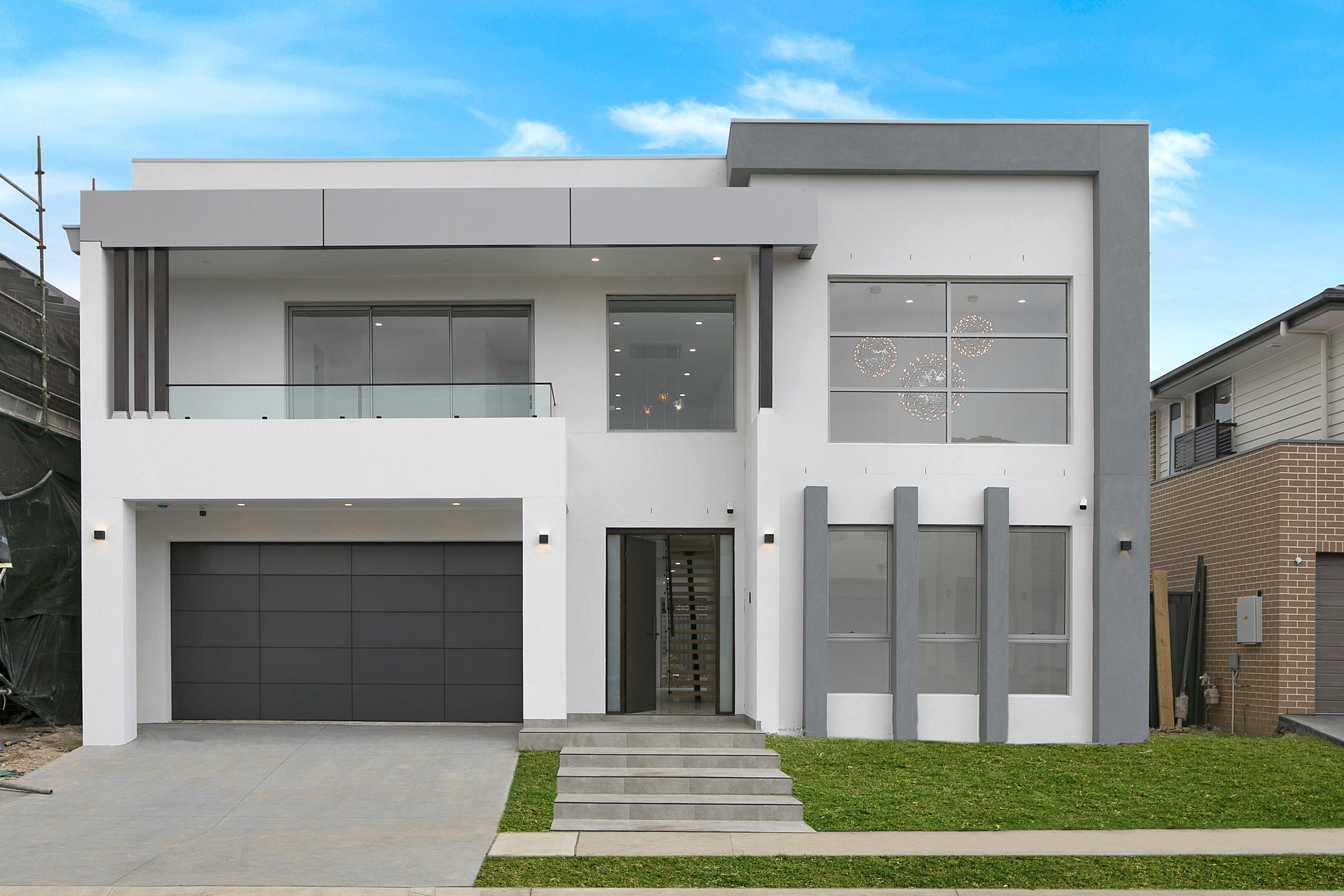 Dezire Homes build, grey and white facade with accent features