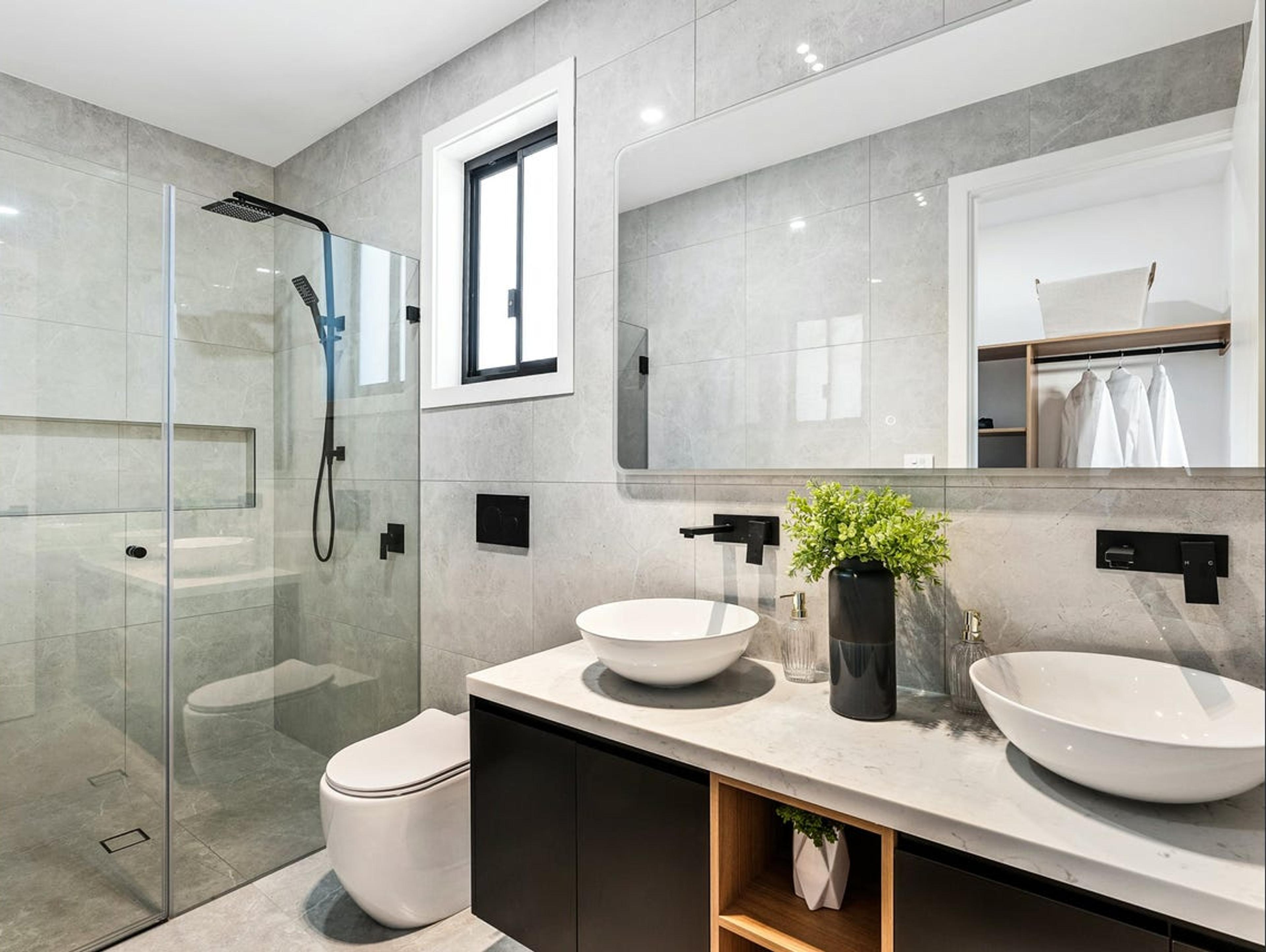 Dezire Homes build, a contemporary all black and white bathroom