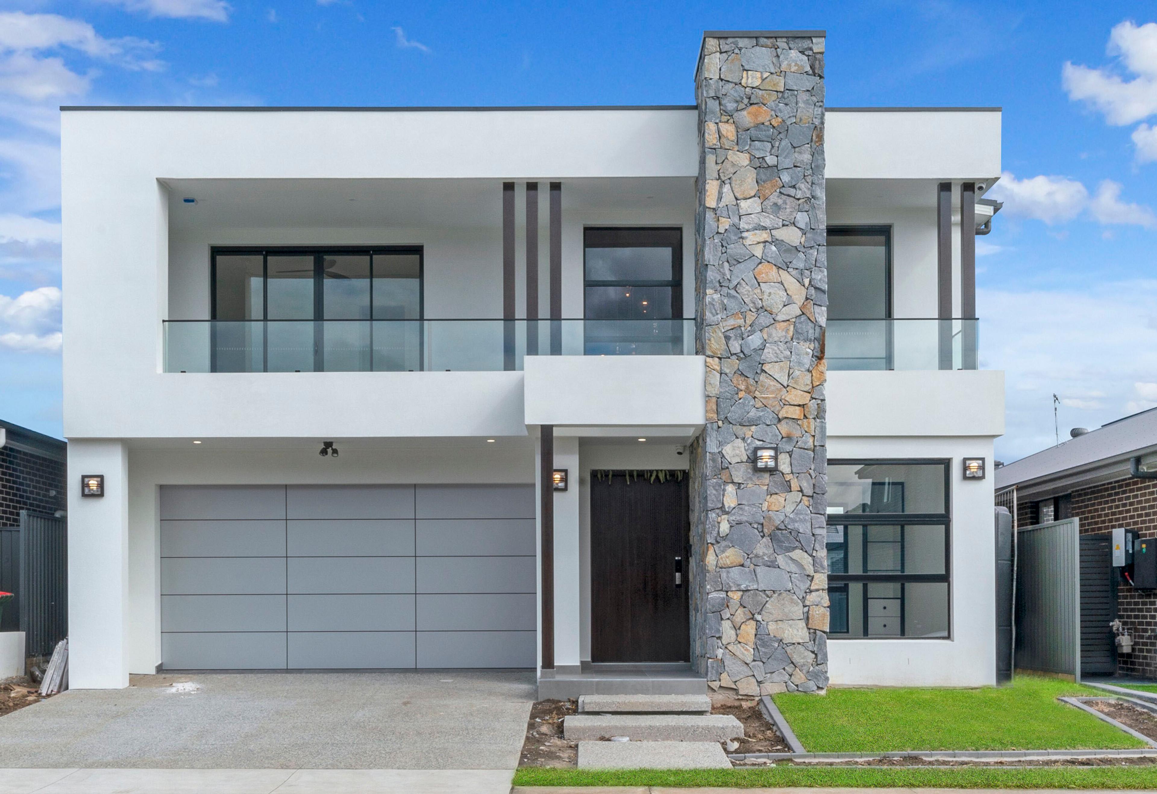 Dezire Homes Build, stylish facade with stacked stone feature