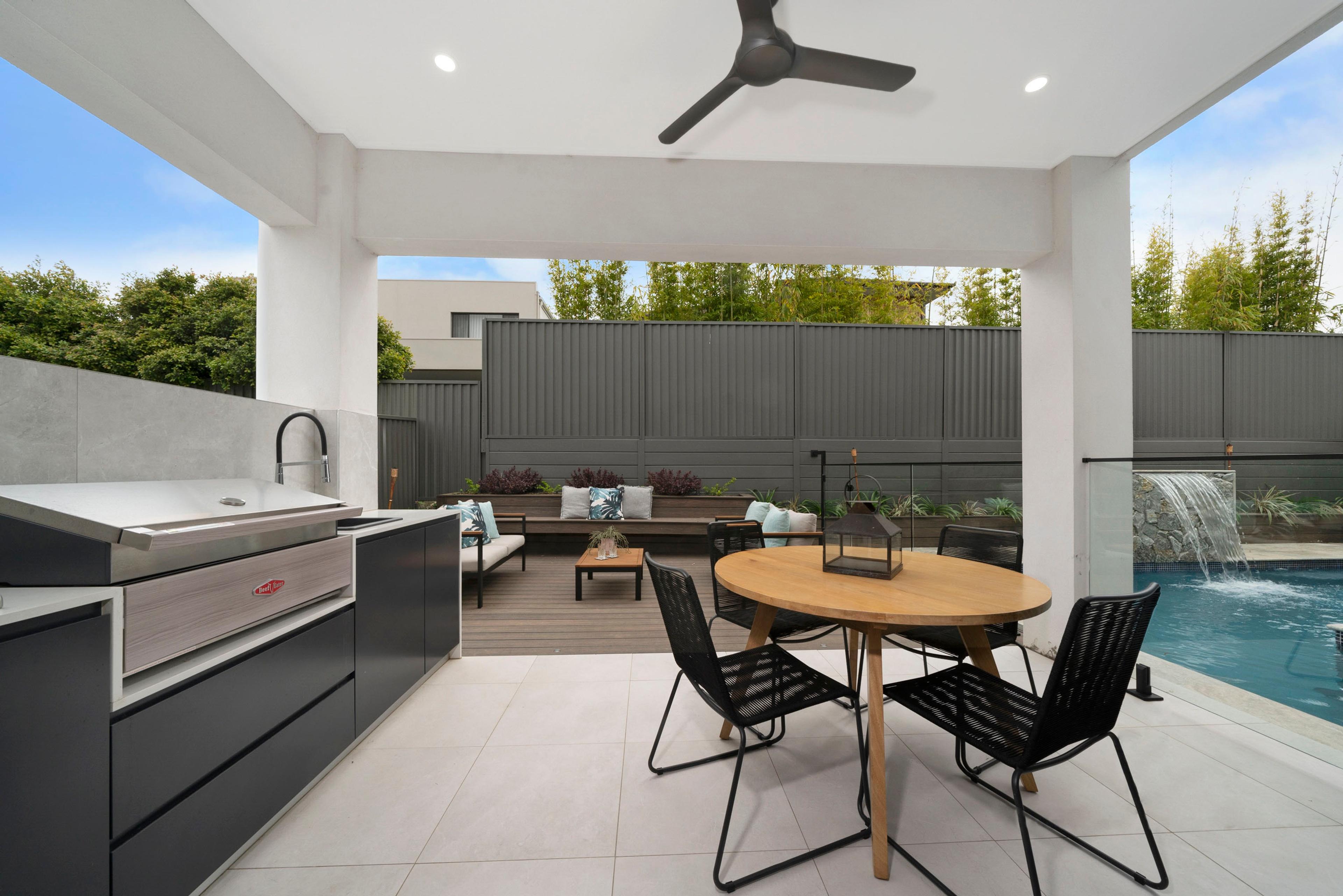 Dezire Homes build, outdoor entertainer's backyard with patio and barbeque