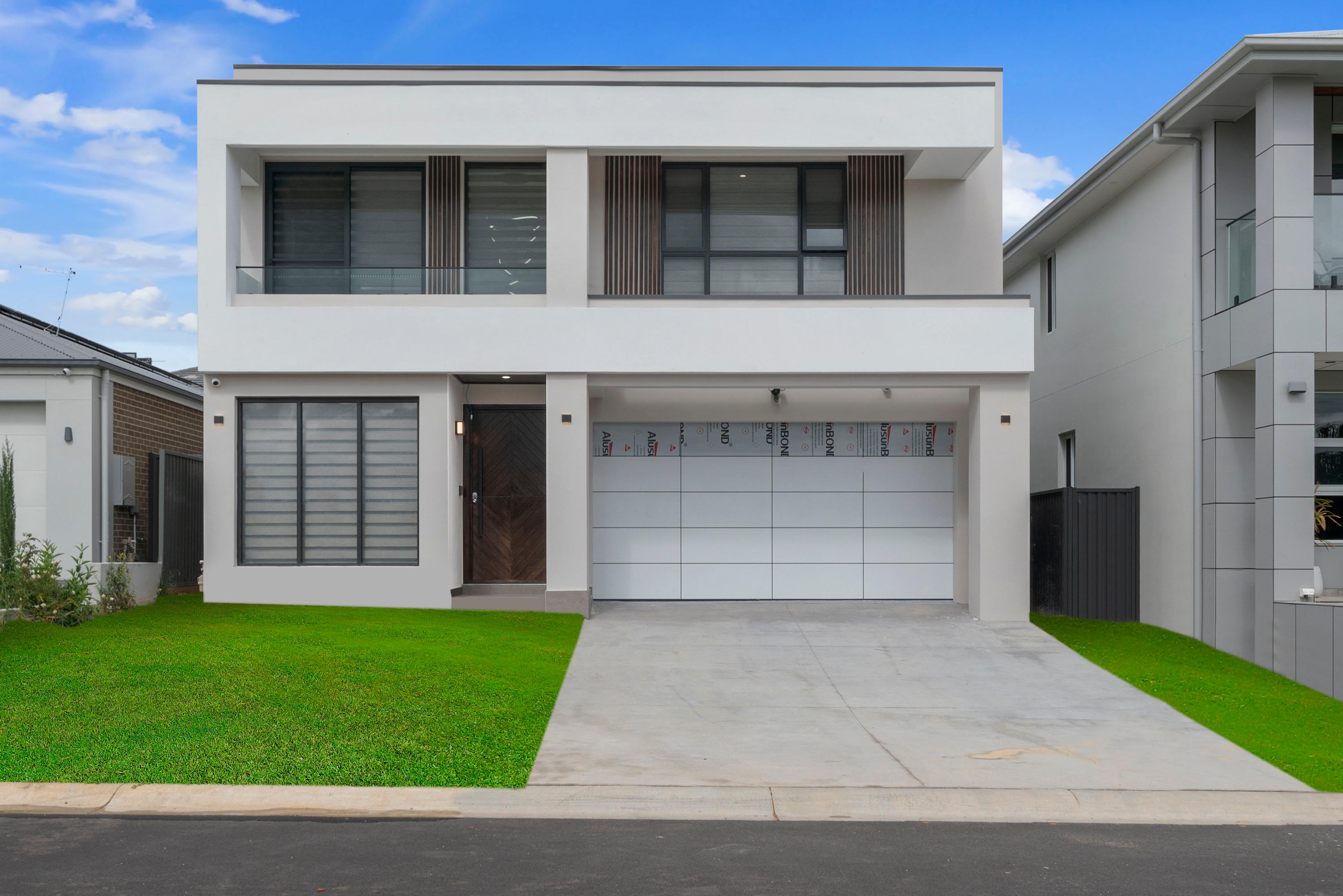 Dezire Homes build, minimal modern facade with balcony features