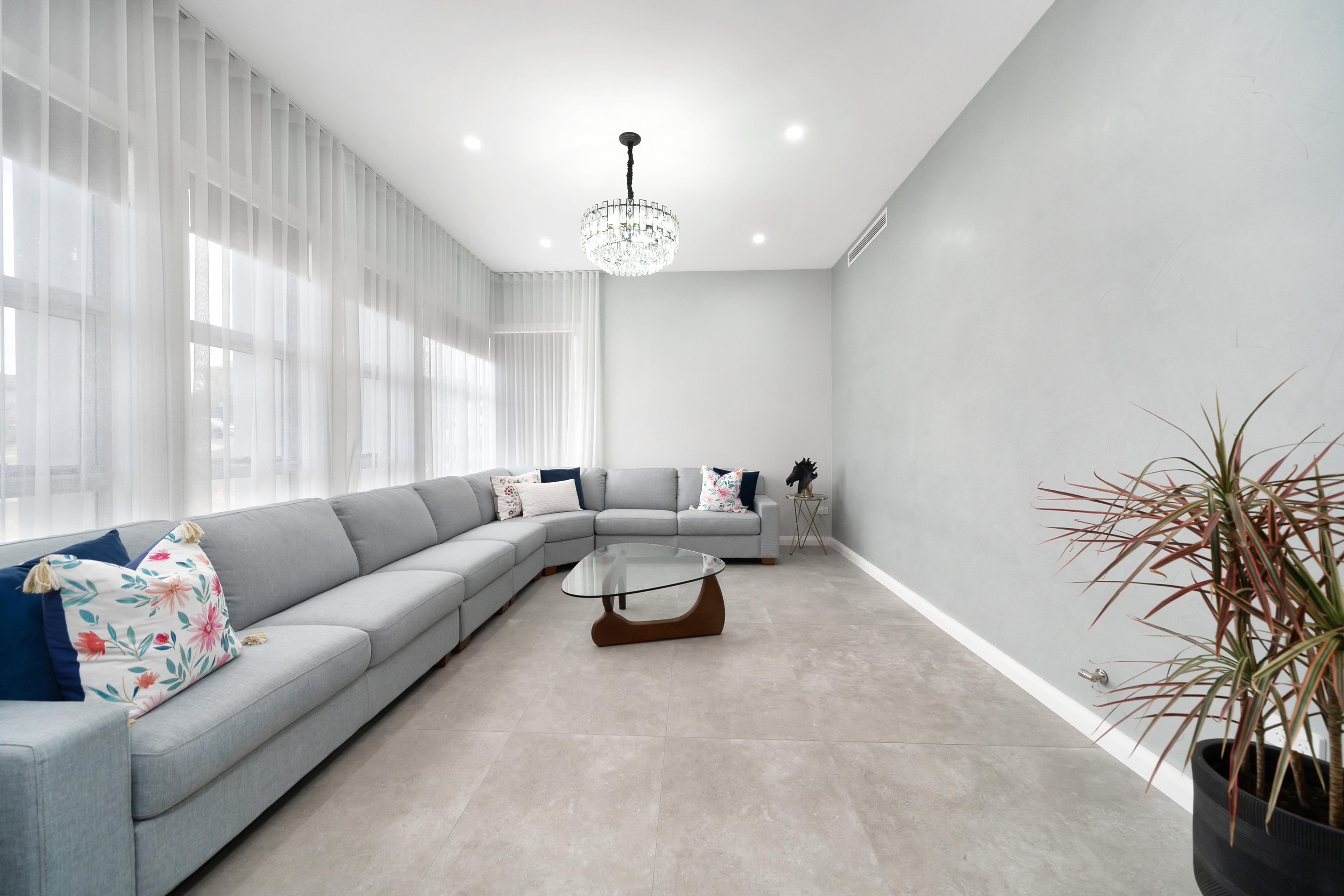 Dezire Homes build, huge lounge area with cascading windows