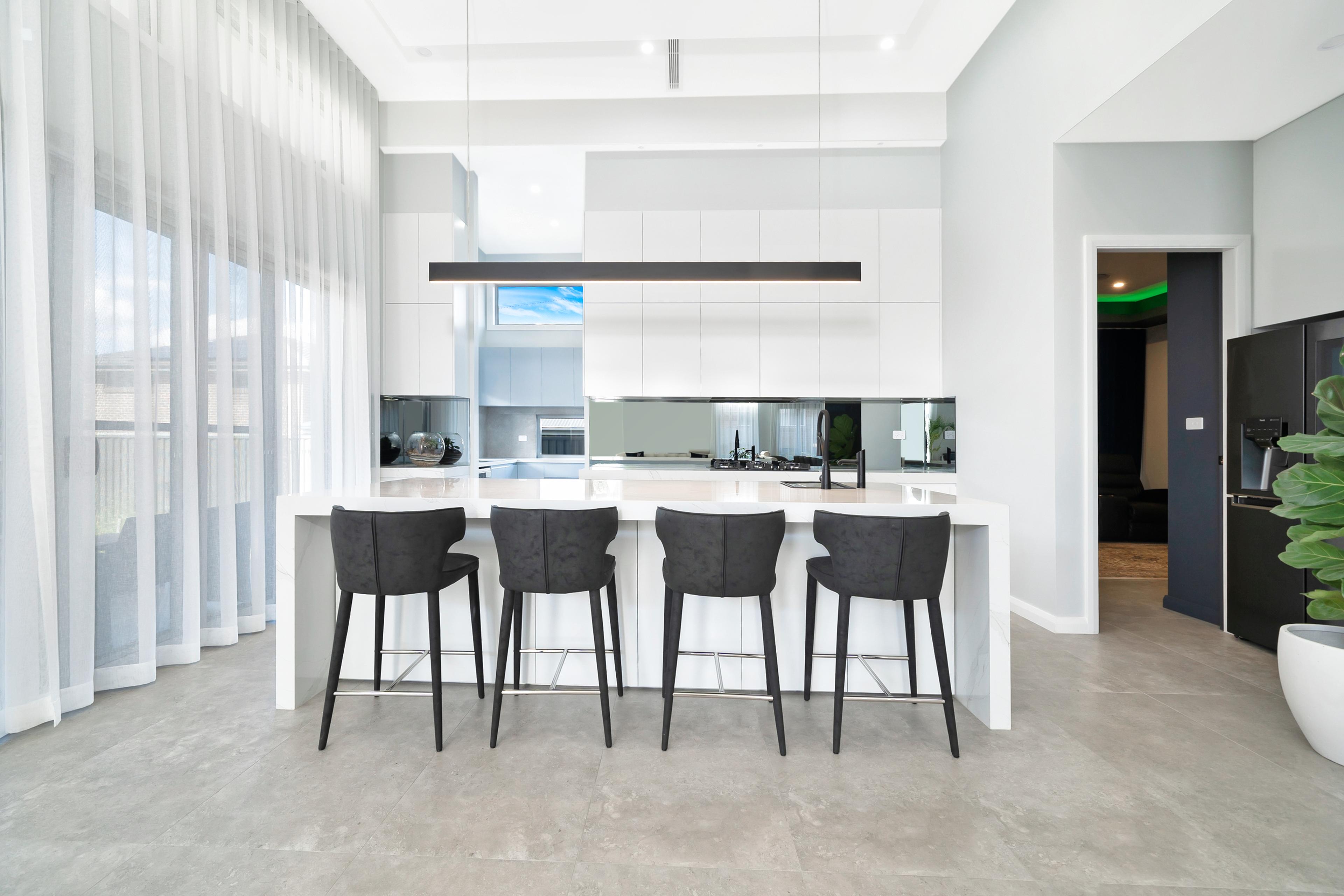 Dezire Homes build, modern kitchen space in all white with black accents