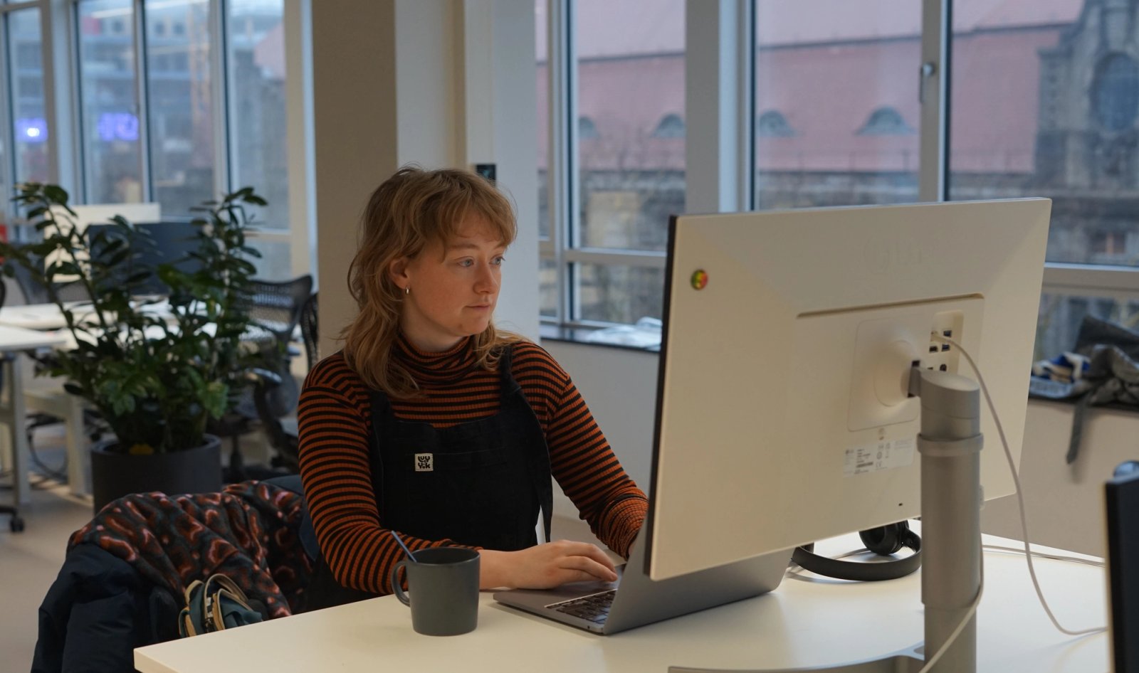 Hiske working on her project at humanoids behind her computer