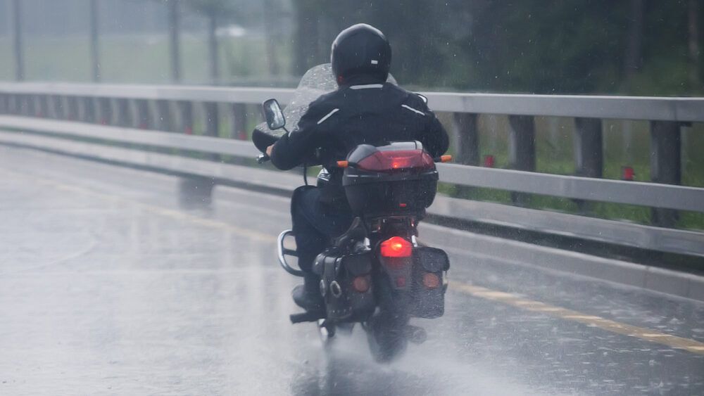www.aceyourcase.com_blog_navigating-rain-related-motorcycle-accidents-in-florida_-motorcycle-in-the-rain-edited.jpg