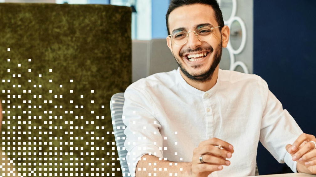 man in glasses smiling