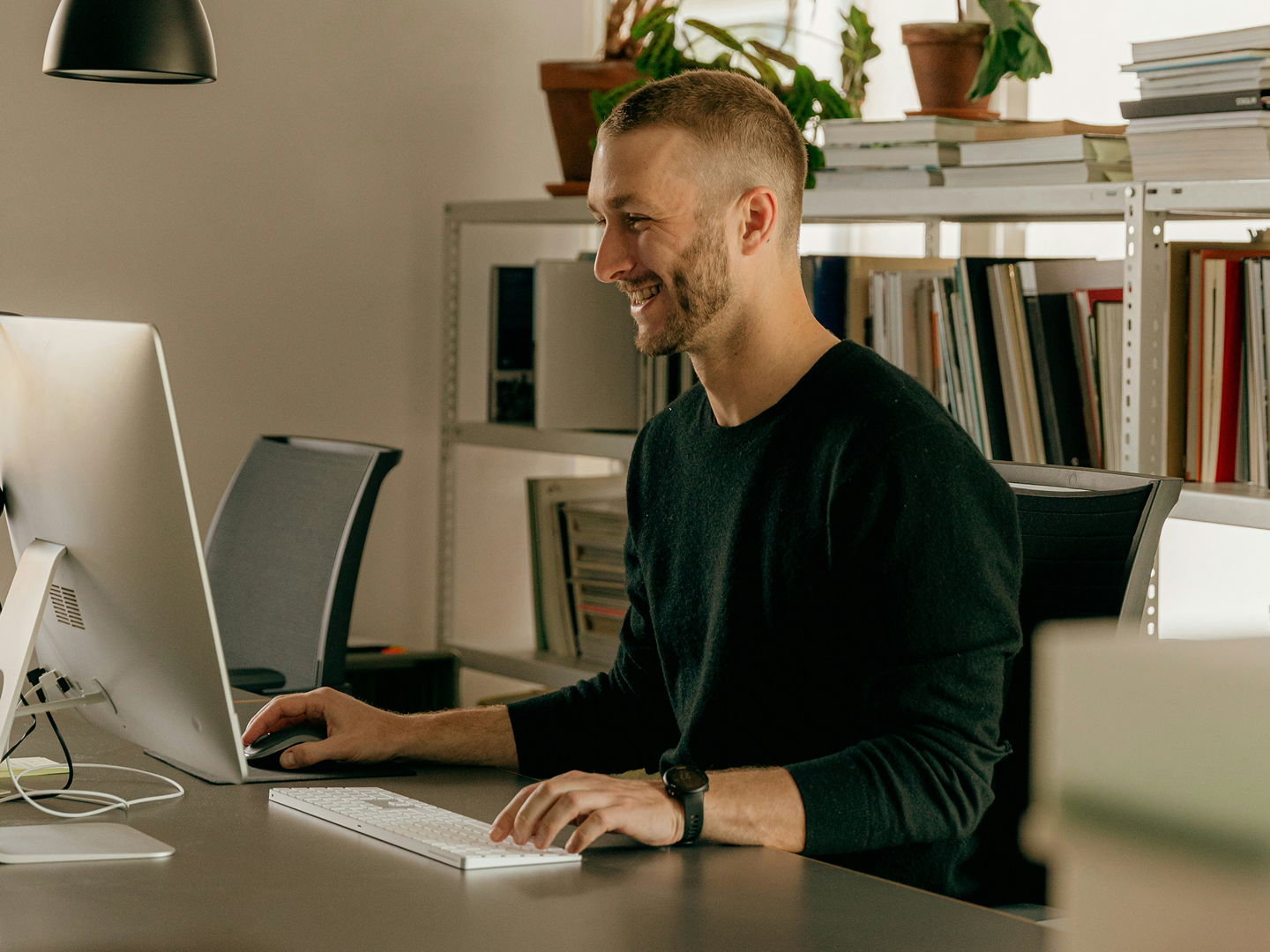 Man sitting in front of computer