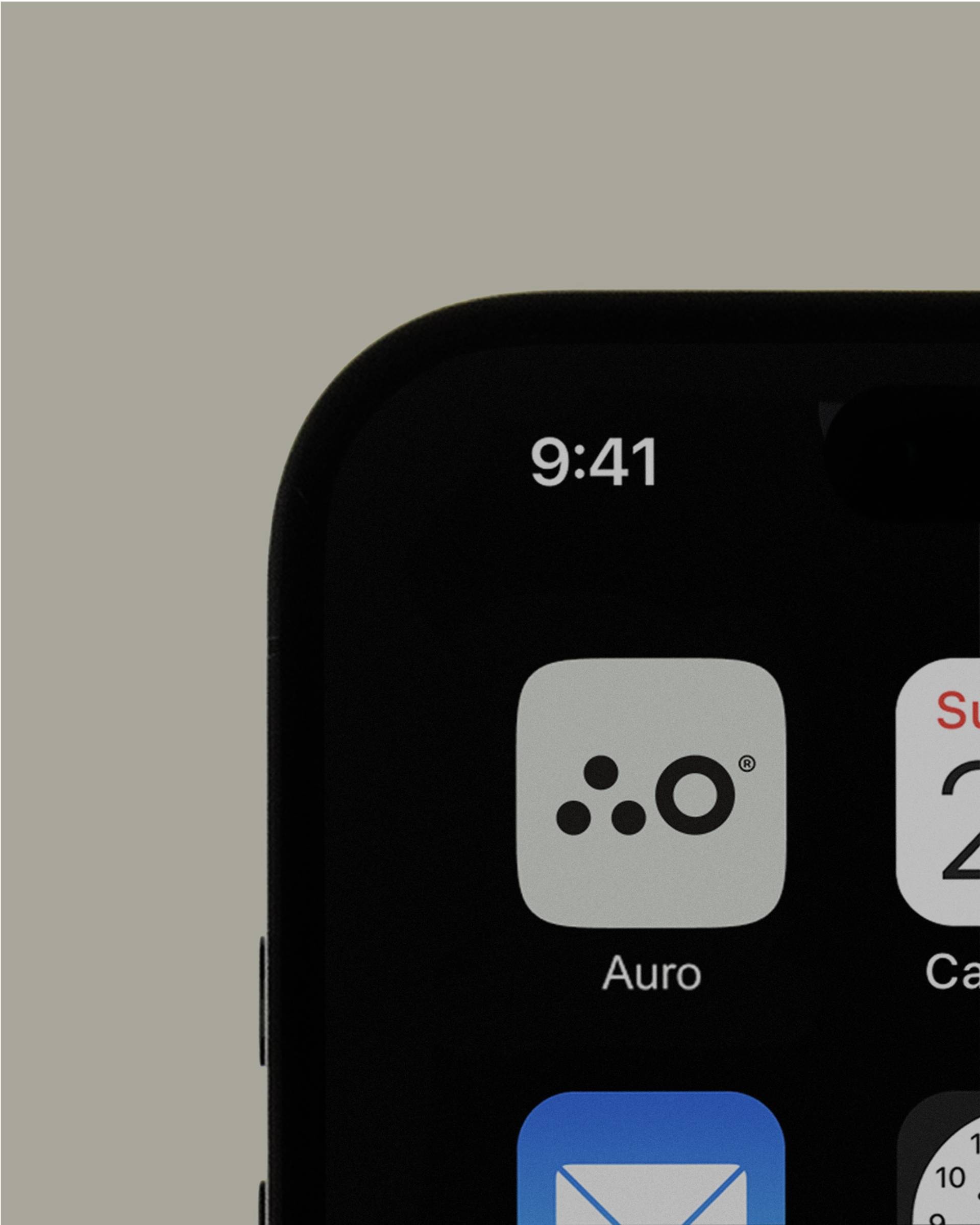 A smartphone lock screen and home screen showing app icons against a black display and beige background.