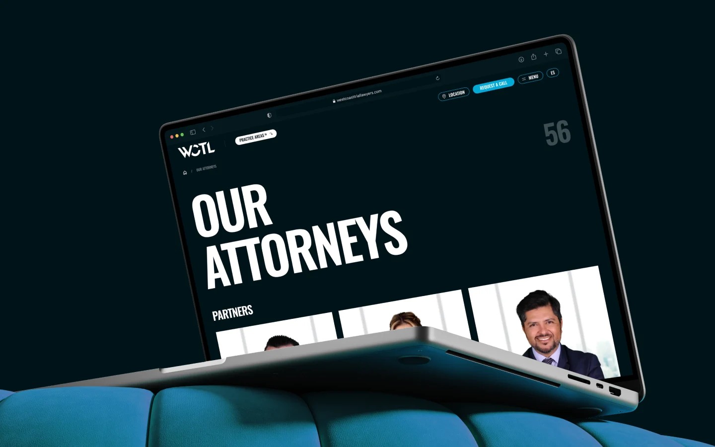 WCTL law firm website page on laptop displaying team member profiles under "Our Attorneys."