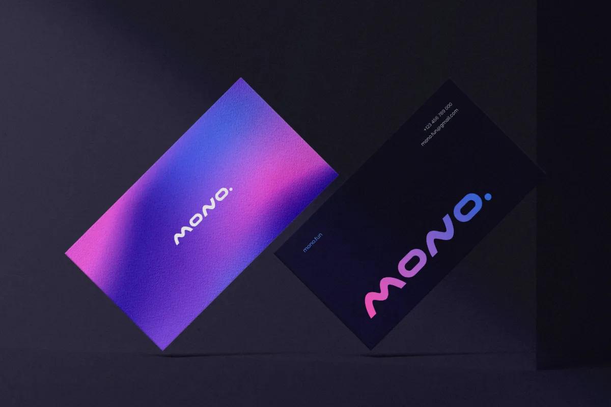 Mono business cards with purple-to-pink gradient wordmark on a dark background