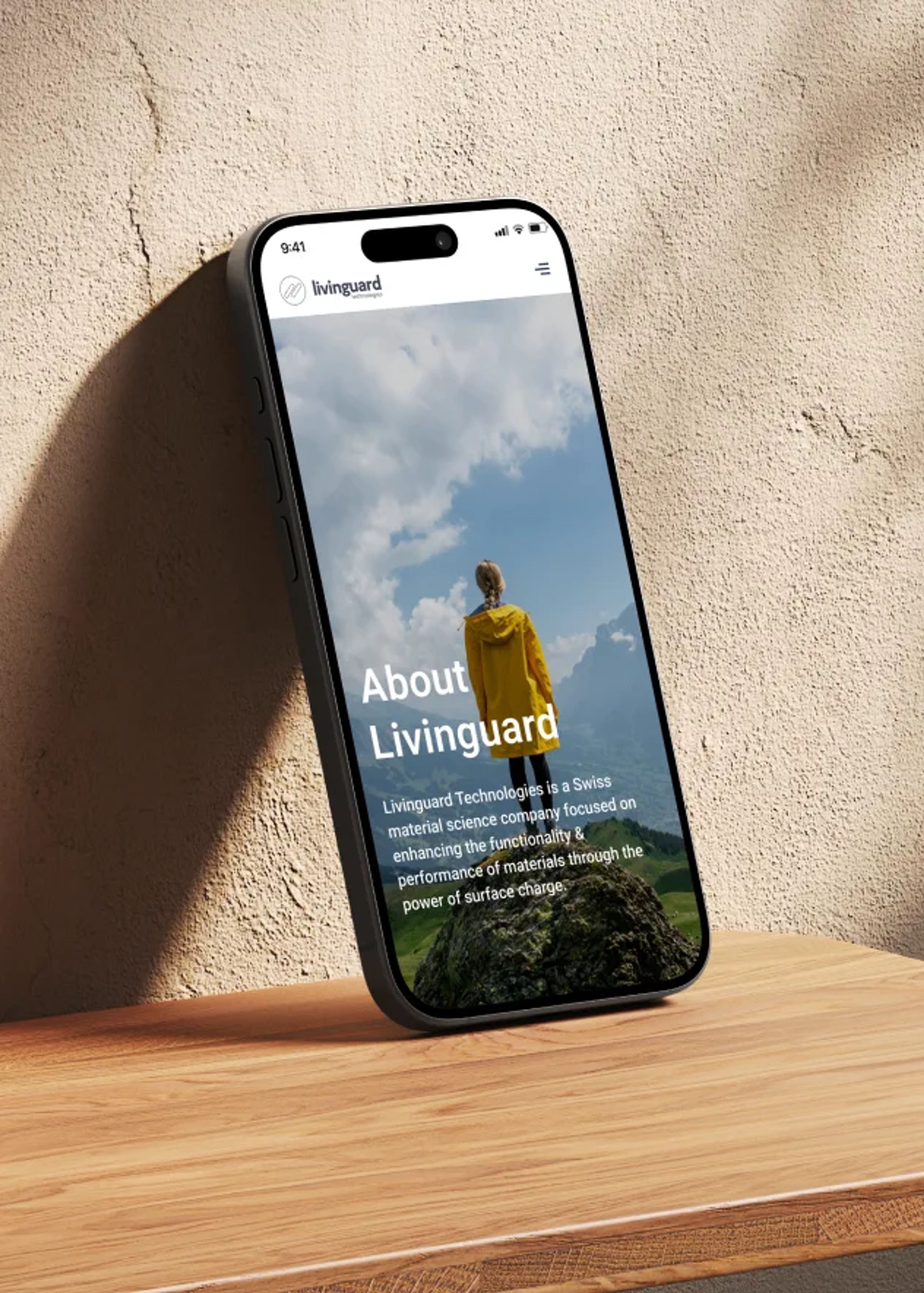 Smartphone displaying Livinguard website.