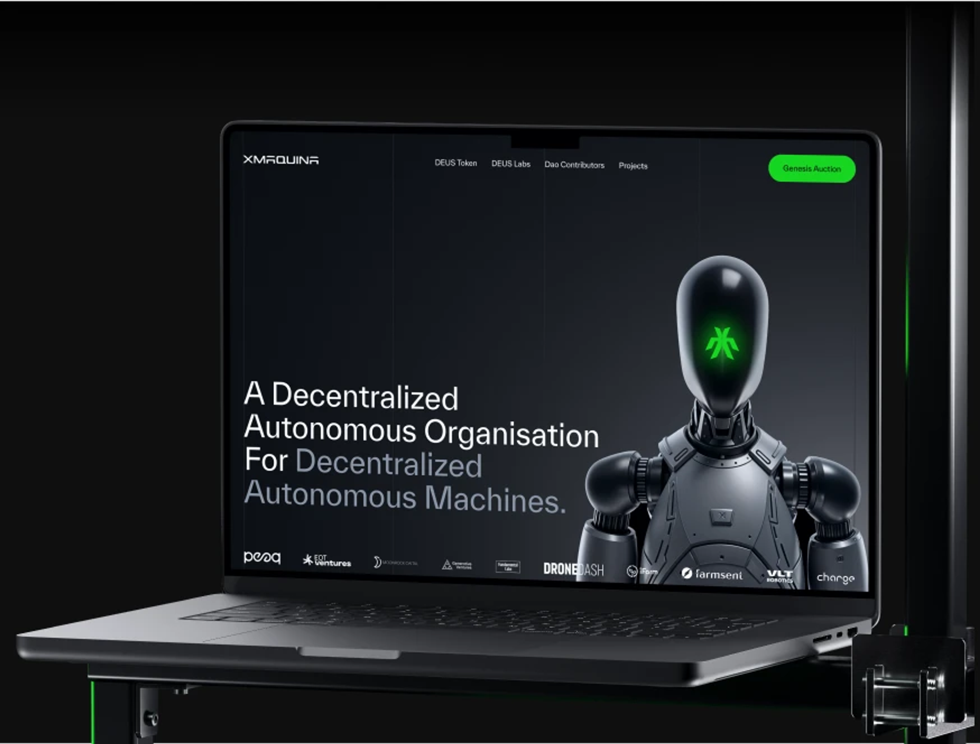 XMAQUINA website on a laptop: DAO for decentralized autonomous machines with a humanoid robot