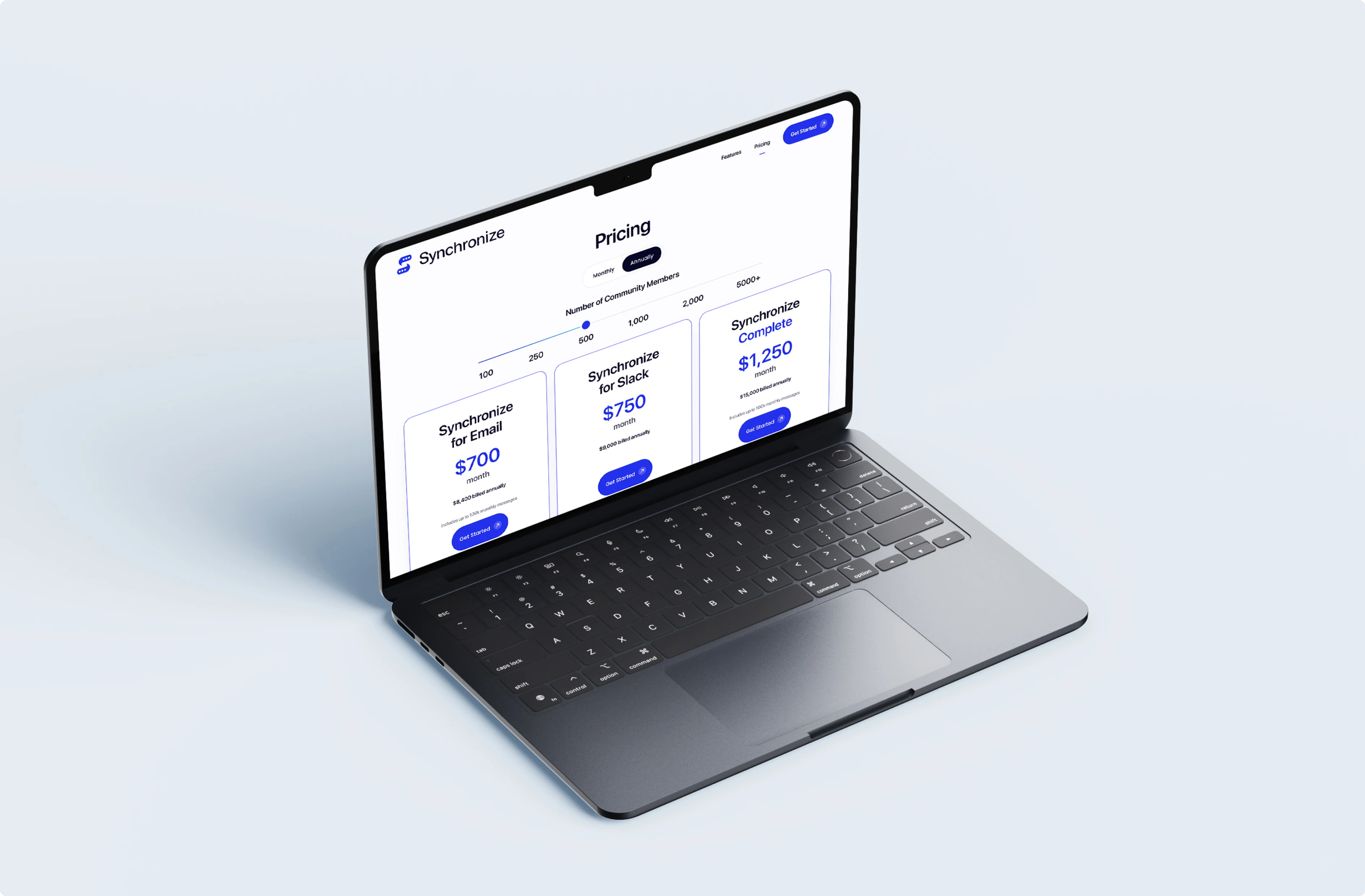 Synchronize pricing page with Email, Slack and Complete plans on a laptop