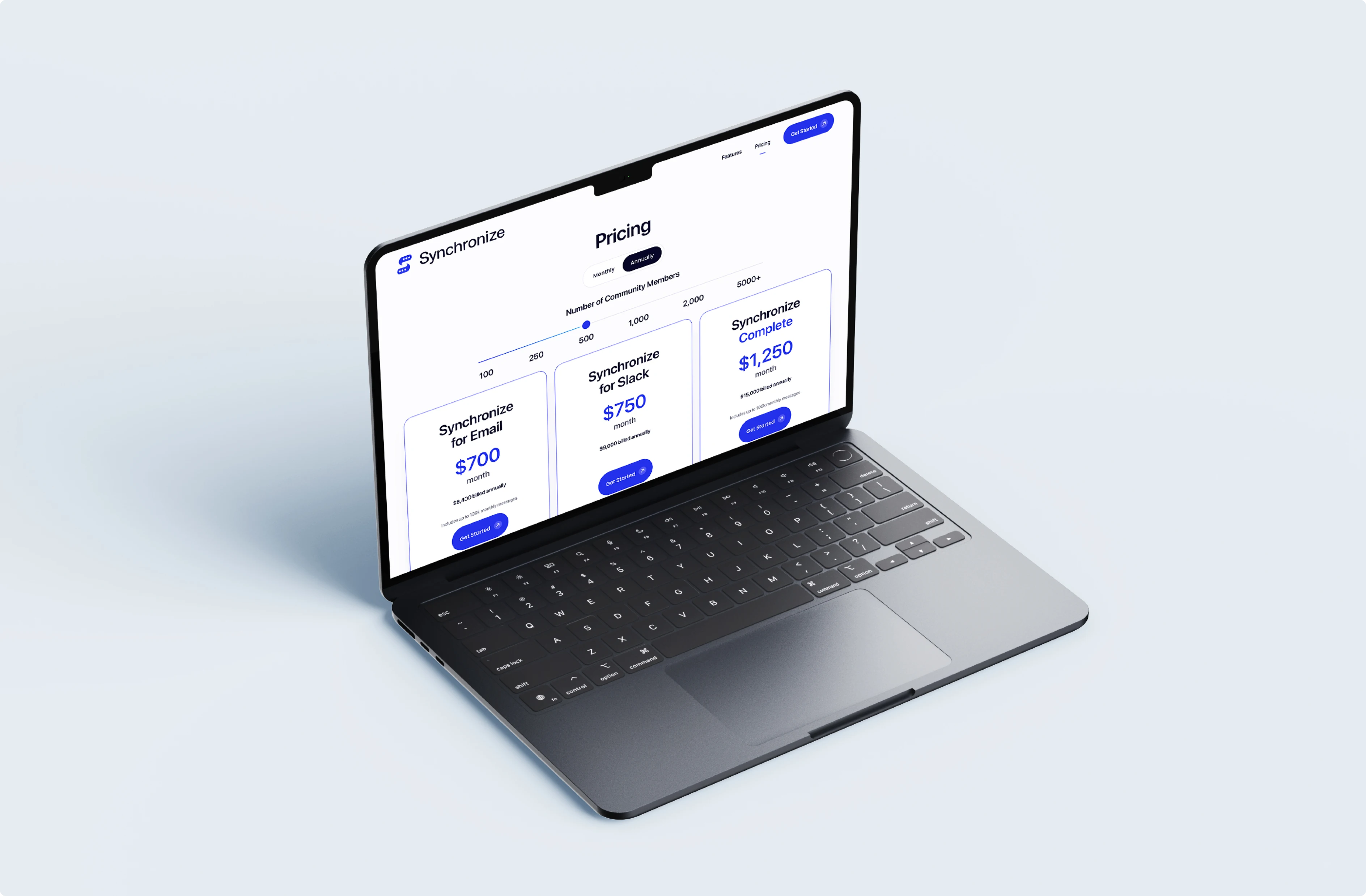 Synchronize pricing page with Email, Slack and Complete plans on a laptop