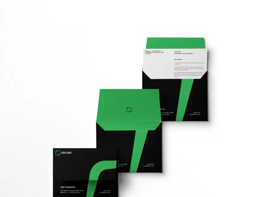 Revver branded envelopes, letter and business card in black and green