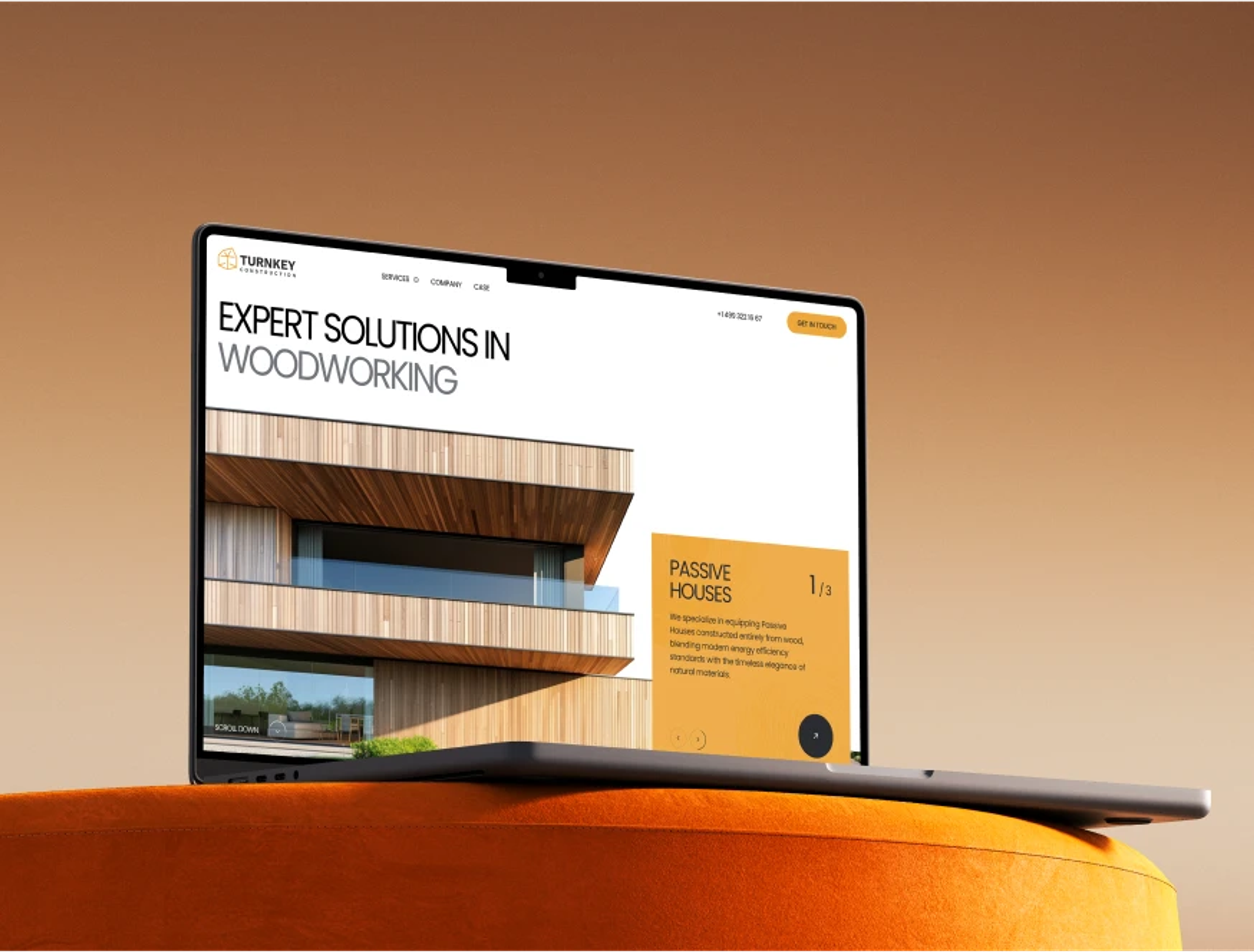 Turnkey website on a laptop: 'Expert Solutions in Woodworking' hero with a timber-clad house