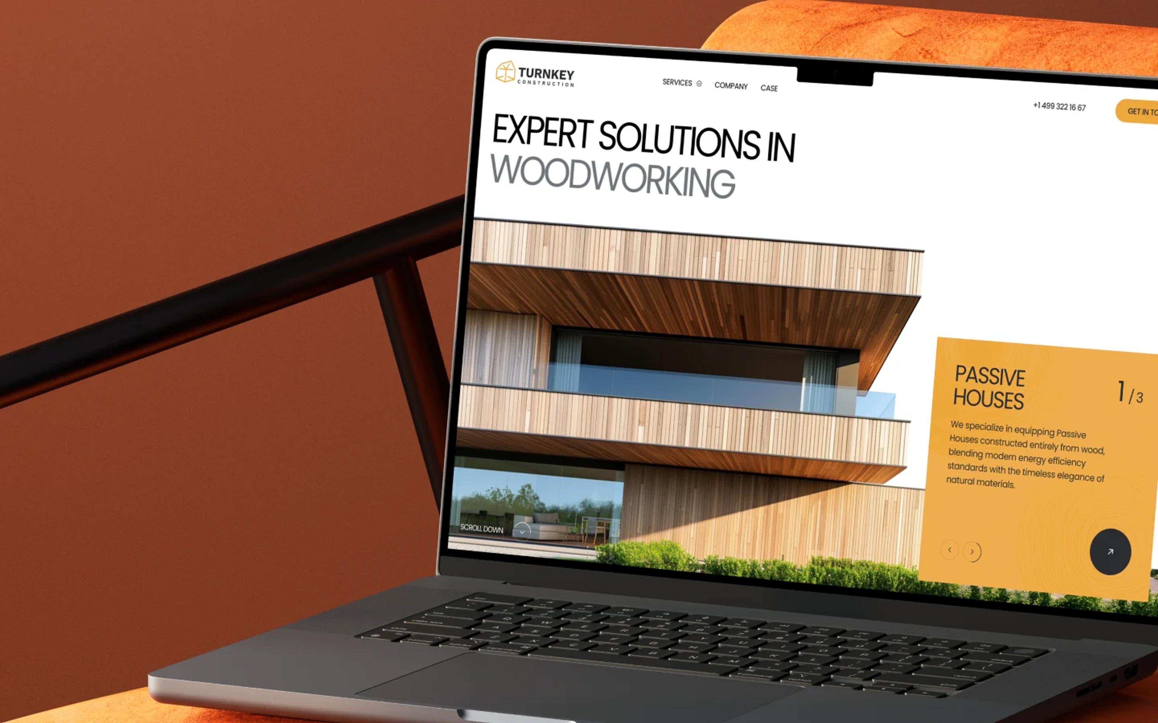 Website design for a woodworking company shown on a laptop screen, featuring a modern timber house with the headline “Expert Solutions in Woodworking.”