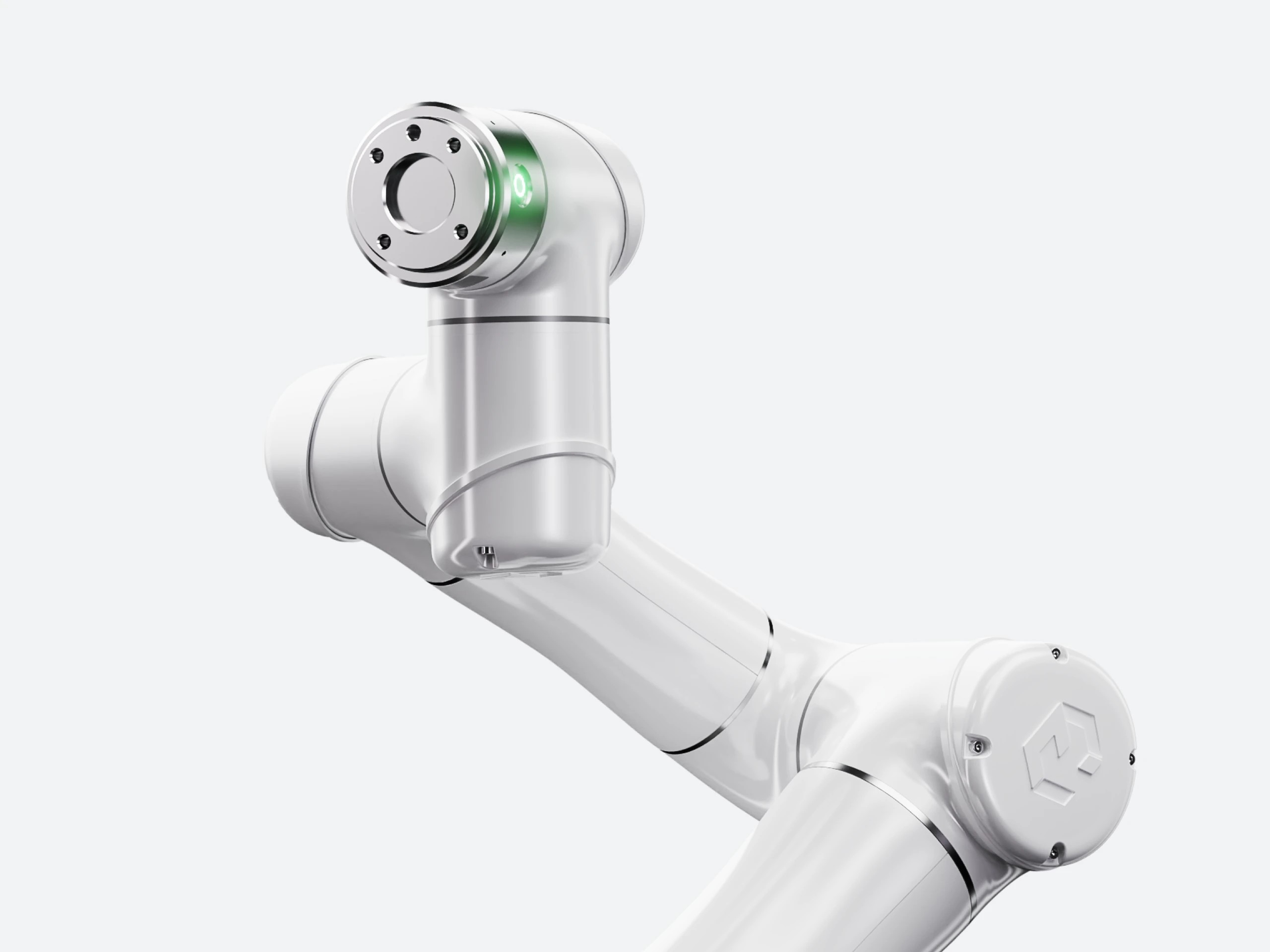 Close-up of a sleek white industrial robotic arm with precision joints, designed for automation in manufacturing and advanced robotics systems.