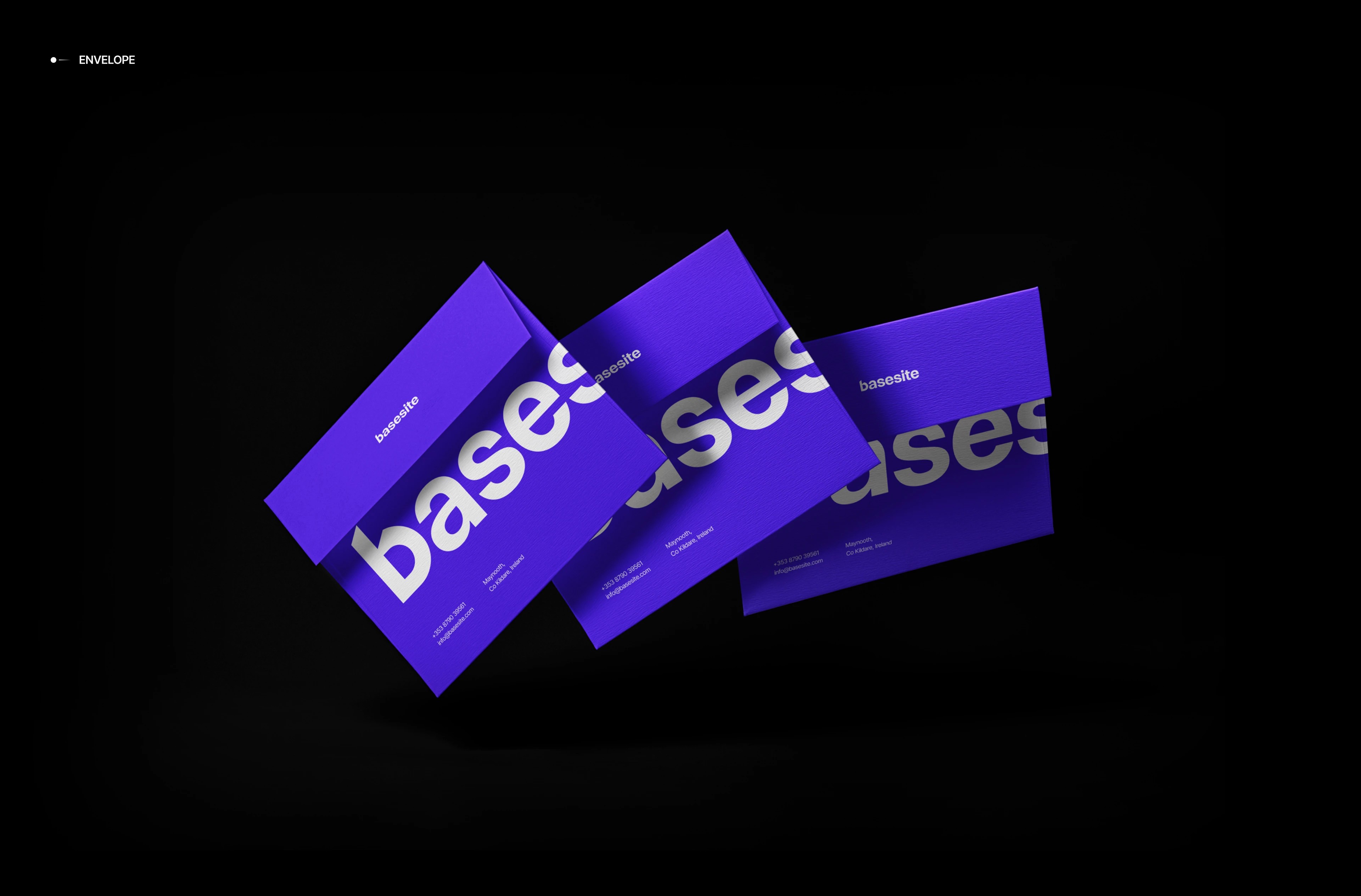 Three violet Basesite envelopes with an oversized wordmark, floating on black