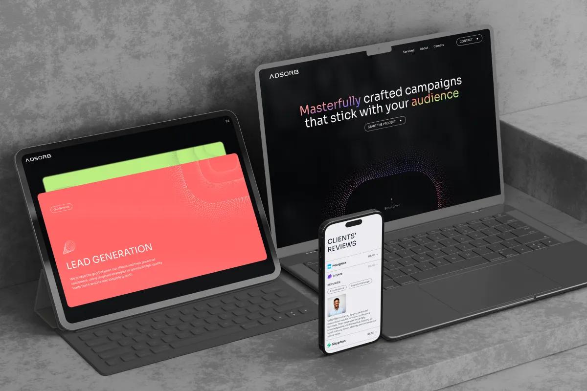 Adsorb website shown on laptop, tablet and phone, with lead generation and client reviews screens