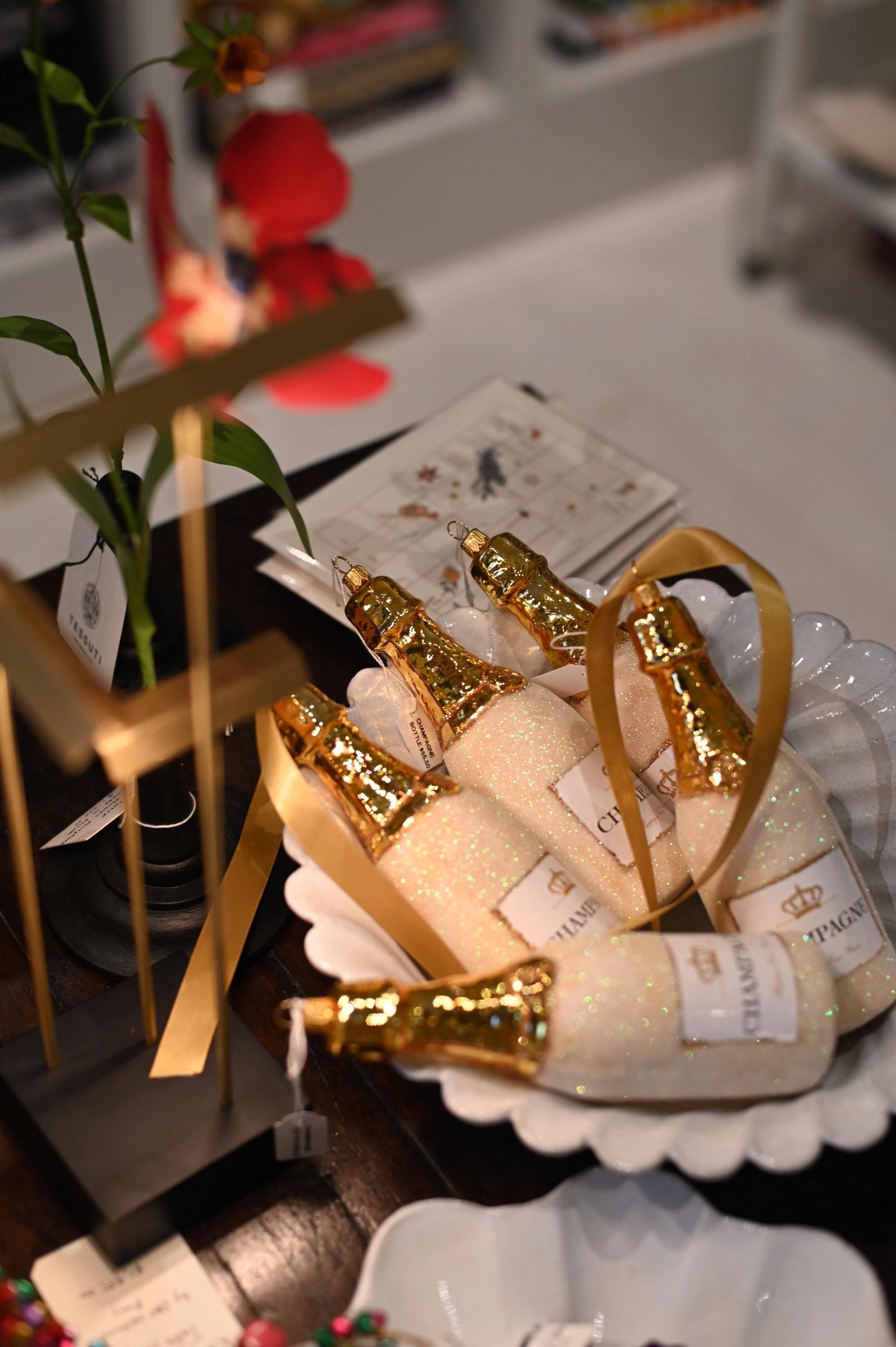 champagne decorations in a bowl under a lamp in store