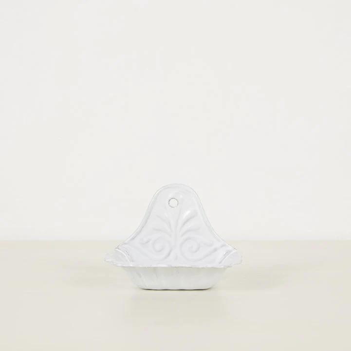 Small white ceramic wall-mounted soap dish. Handmade in Paris with ornate pattern and scalloped edge. Hanging hole at top. Ideal for Pré de Provence soap.