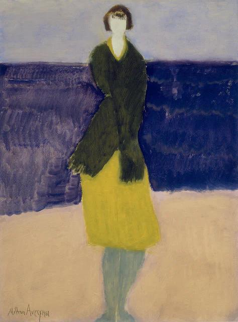 Milton Avery painting of an abstract figure in a green coat and yellow skirt standing on a beach. The deep blue ocean and pale sand background evoke serenity and contemplation.