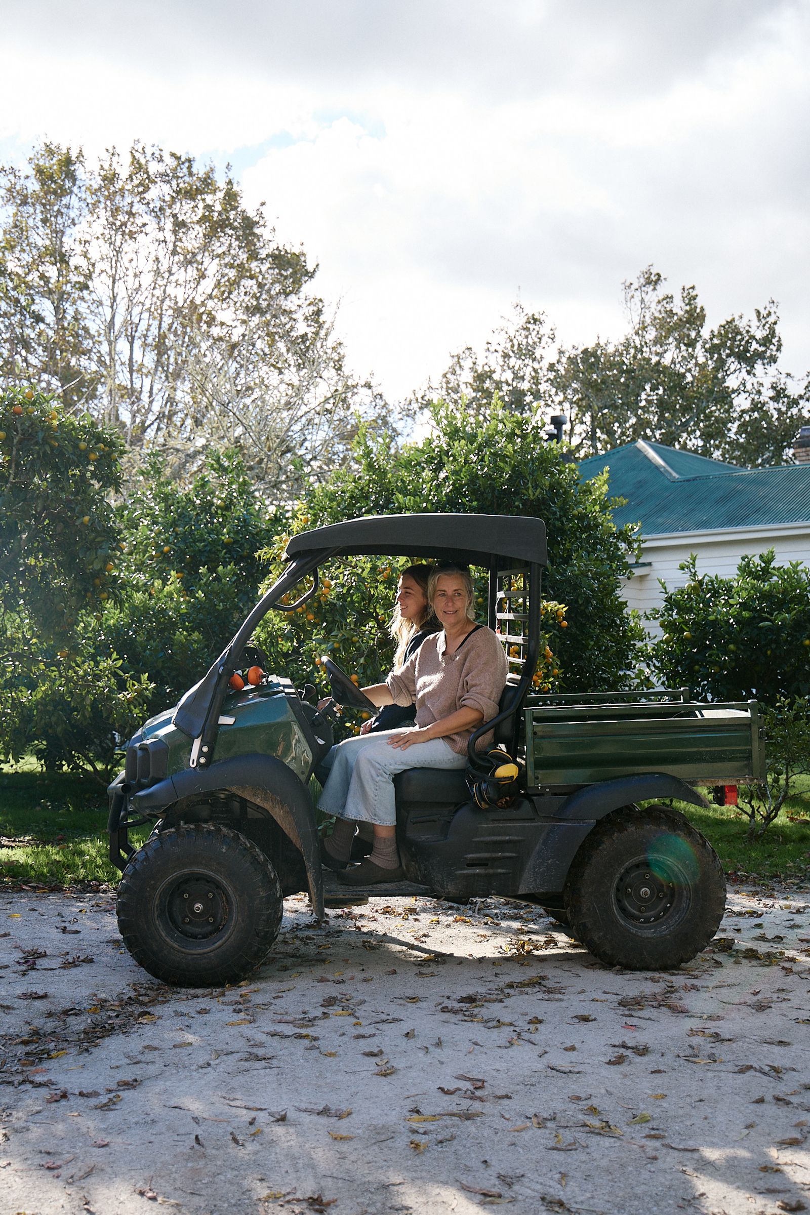 Aila and her mum Astrid in there four wheel buggy on the farm