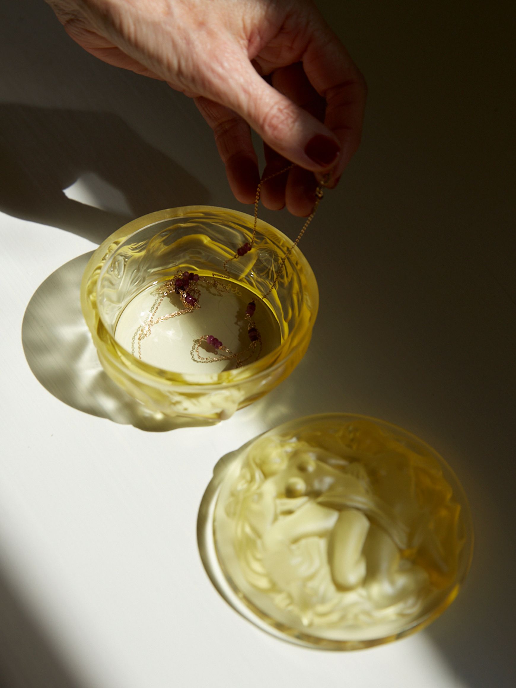 citrine glass by Akua Objects lid off and in sunlight