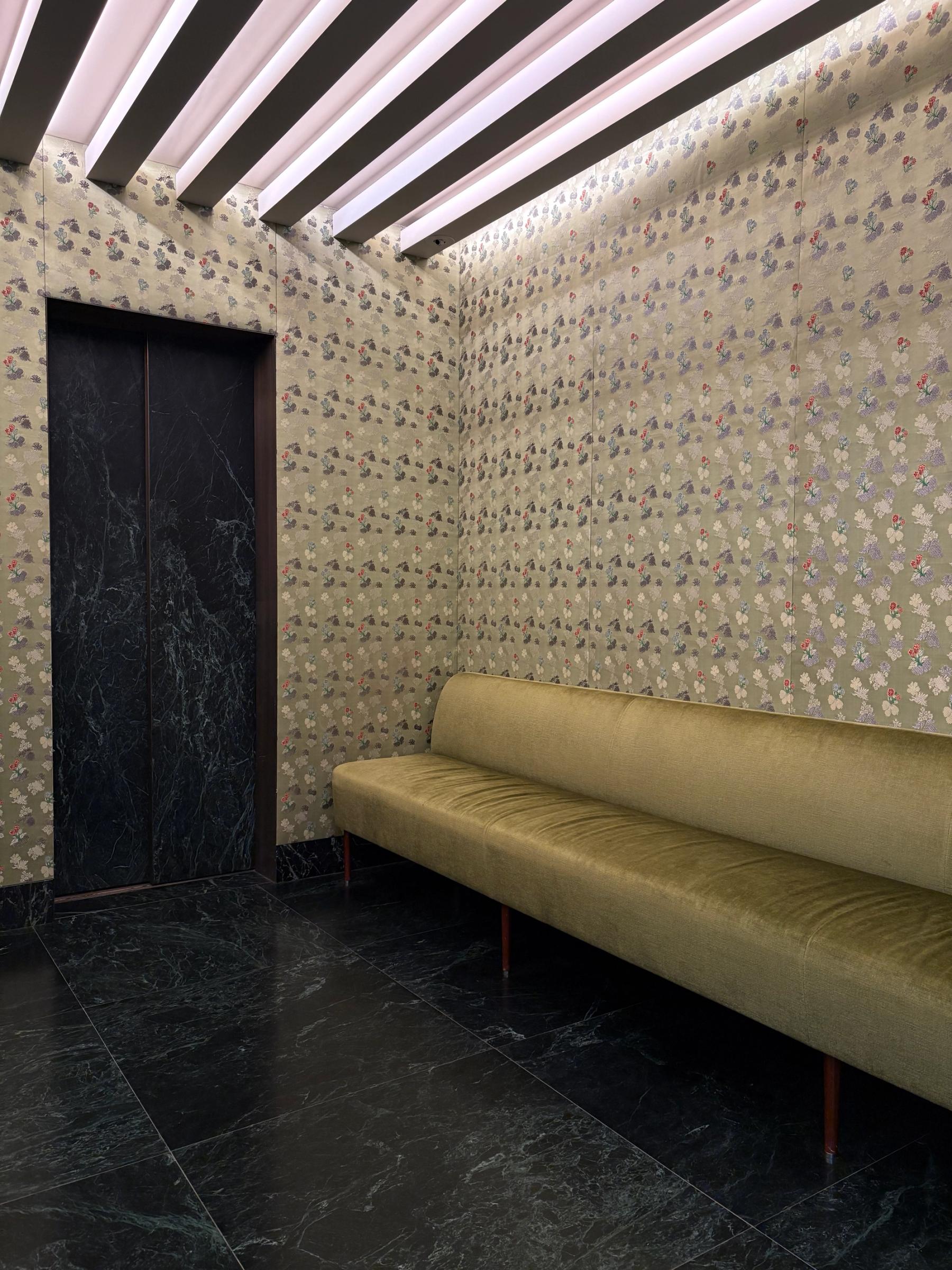 fabric covered walls at the entrance to the bakery