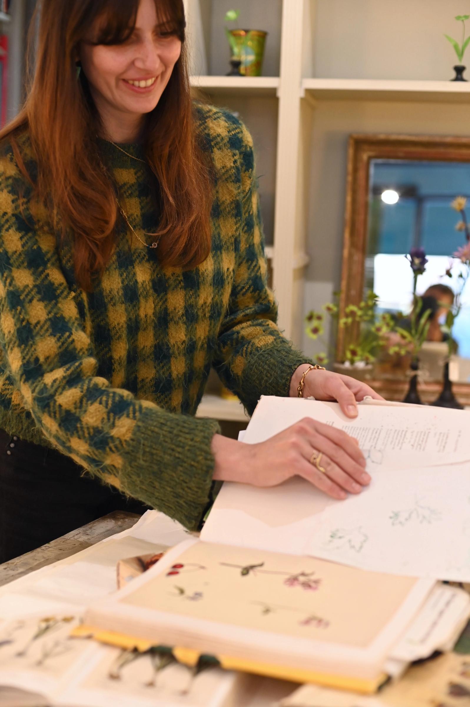 opening up reference books for botanical drawings