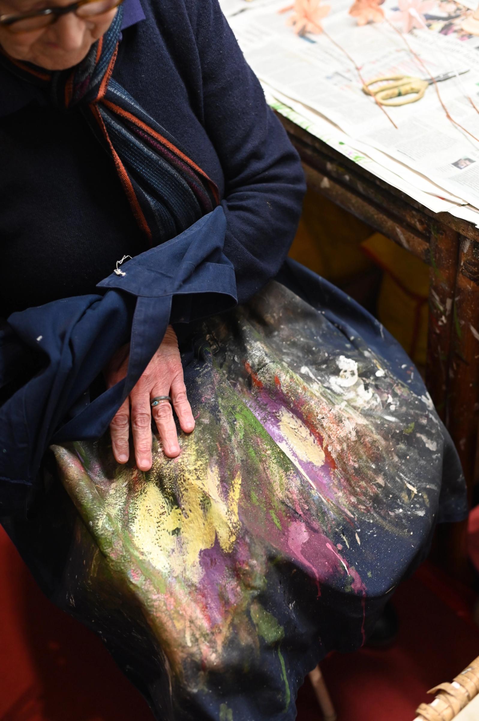 Elizabette's apron covered in paint