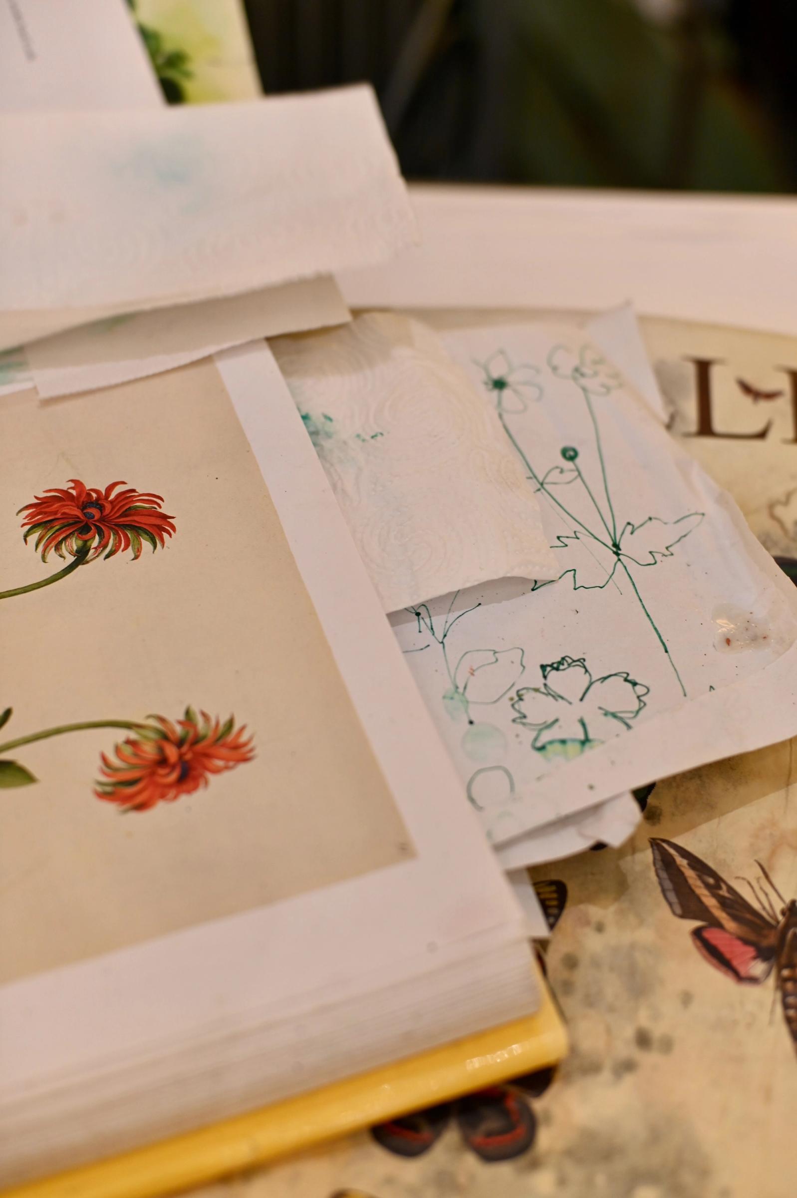 vintage botanical books open and stuffed with paper bookmark