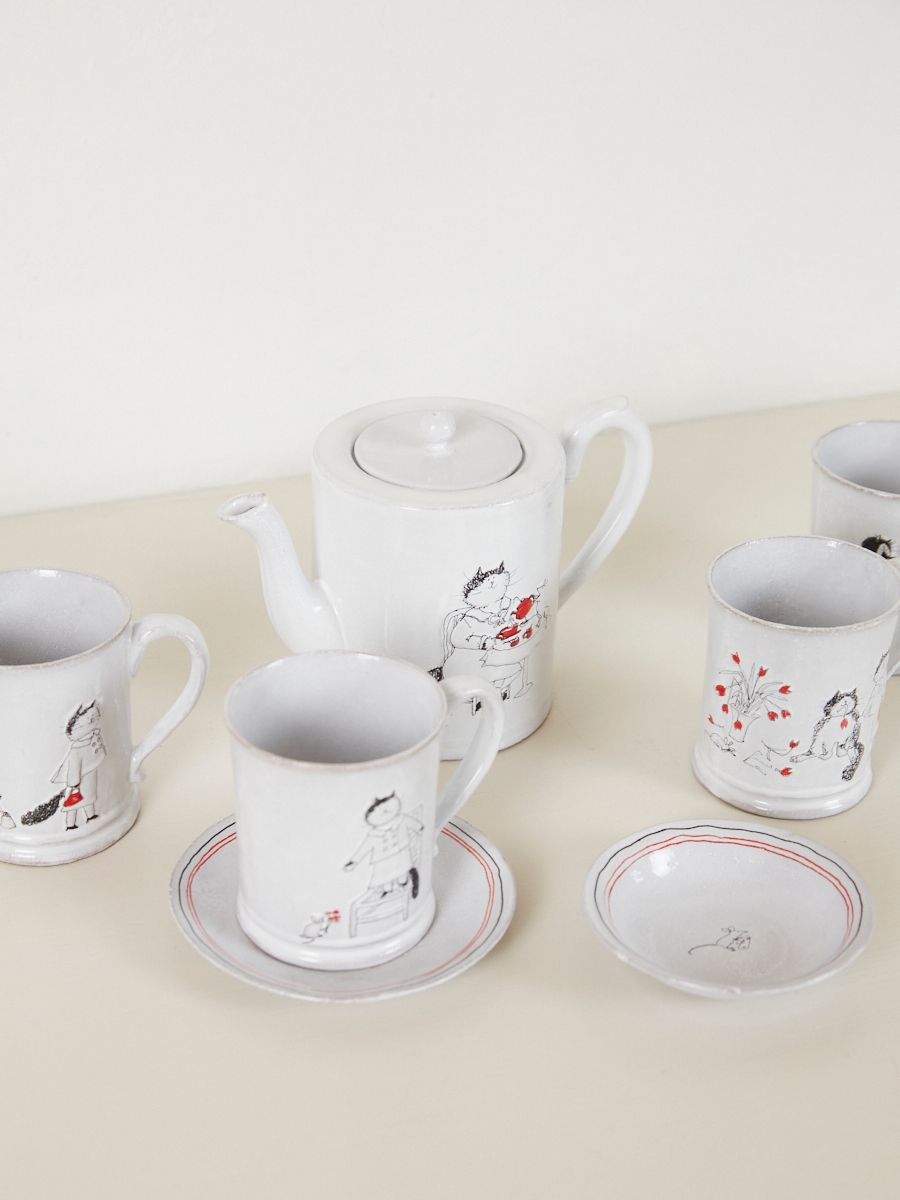 The complete Grace Collection by Astier de Villatte featuring teapot and tea cups and saucers