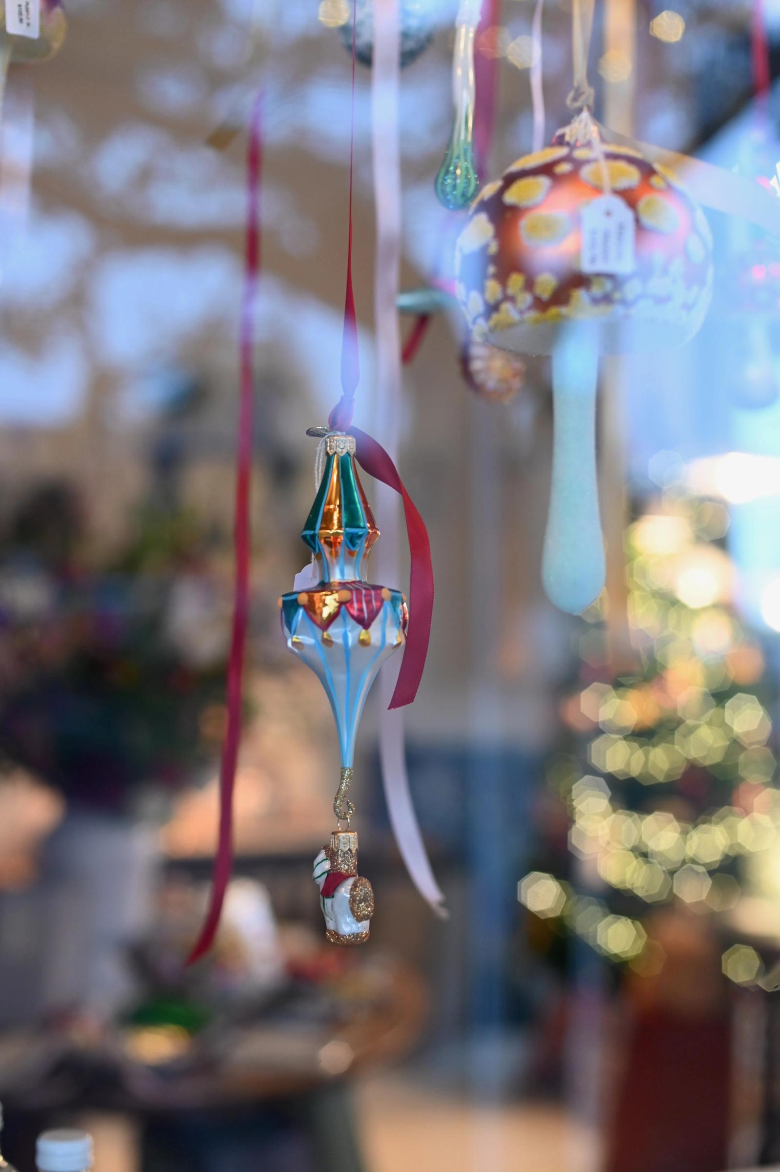 carousel decoration hanging in the window