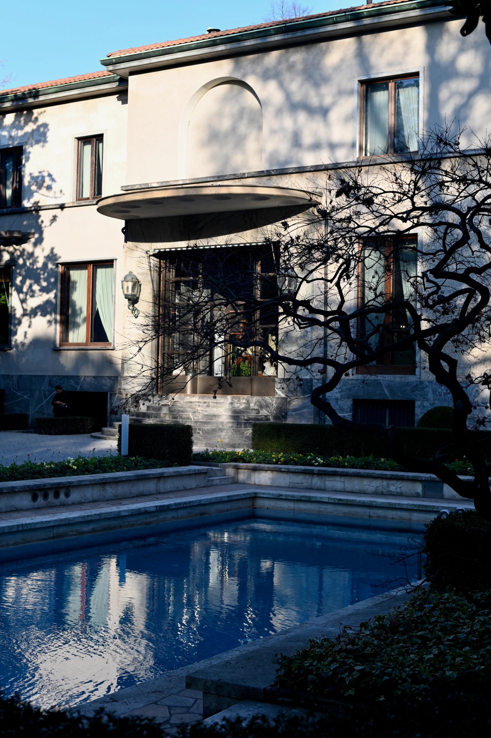 the entrance to Villa Necchi from over a view of the pool
