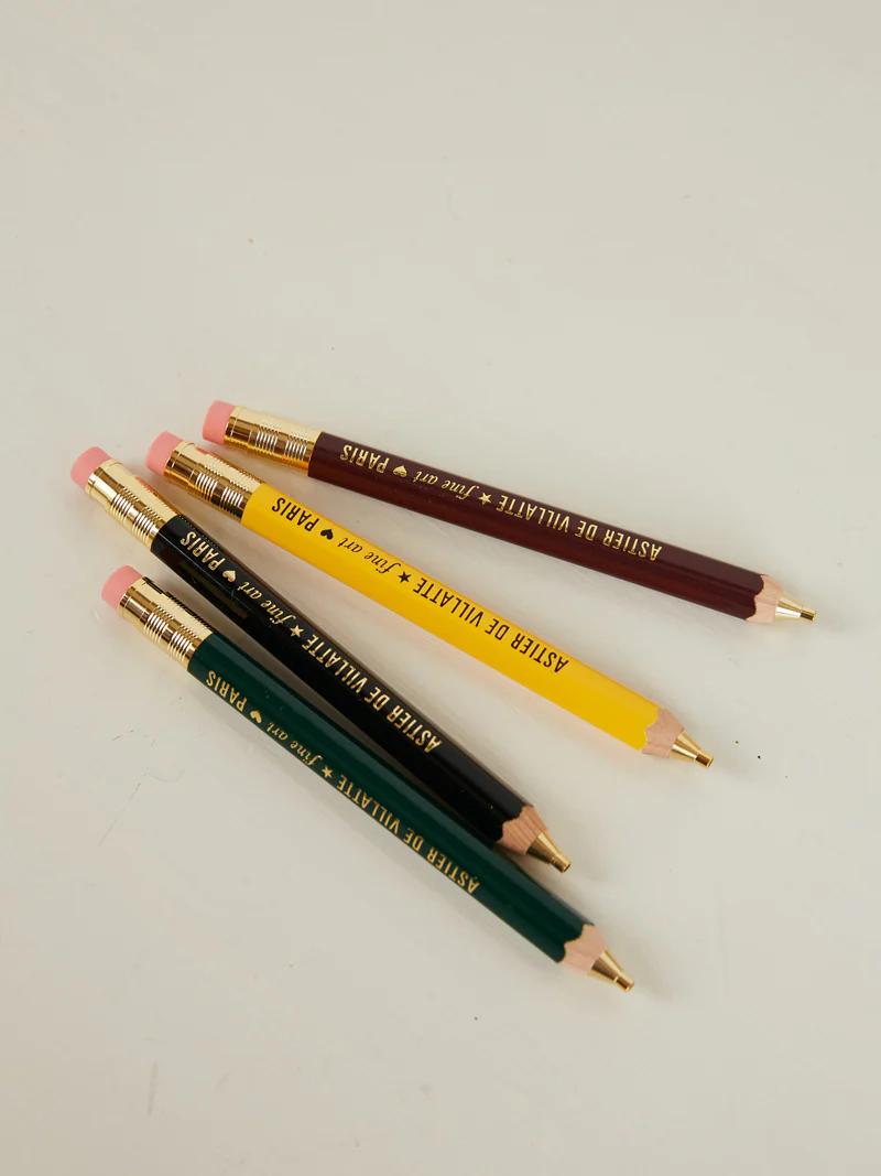 Four pencils with pink erasers on light surface. Labelled "Astier De Villatte Paris".