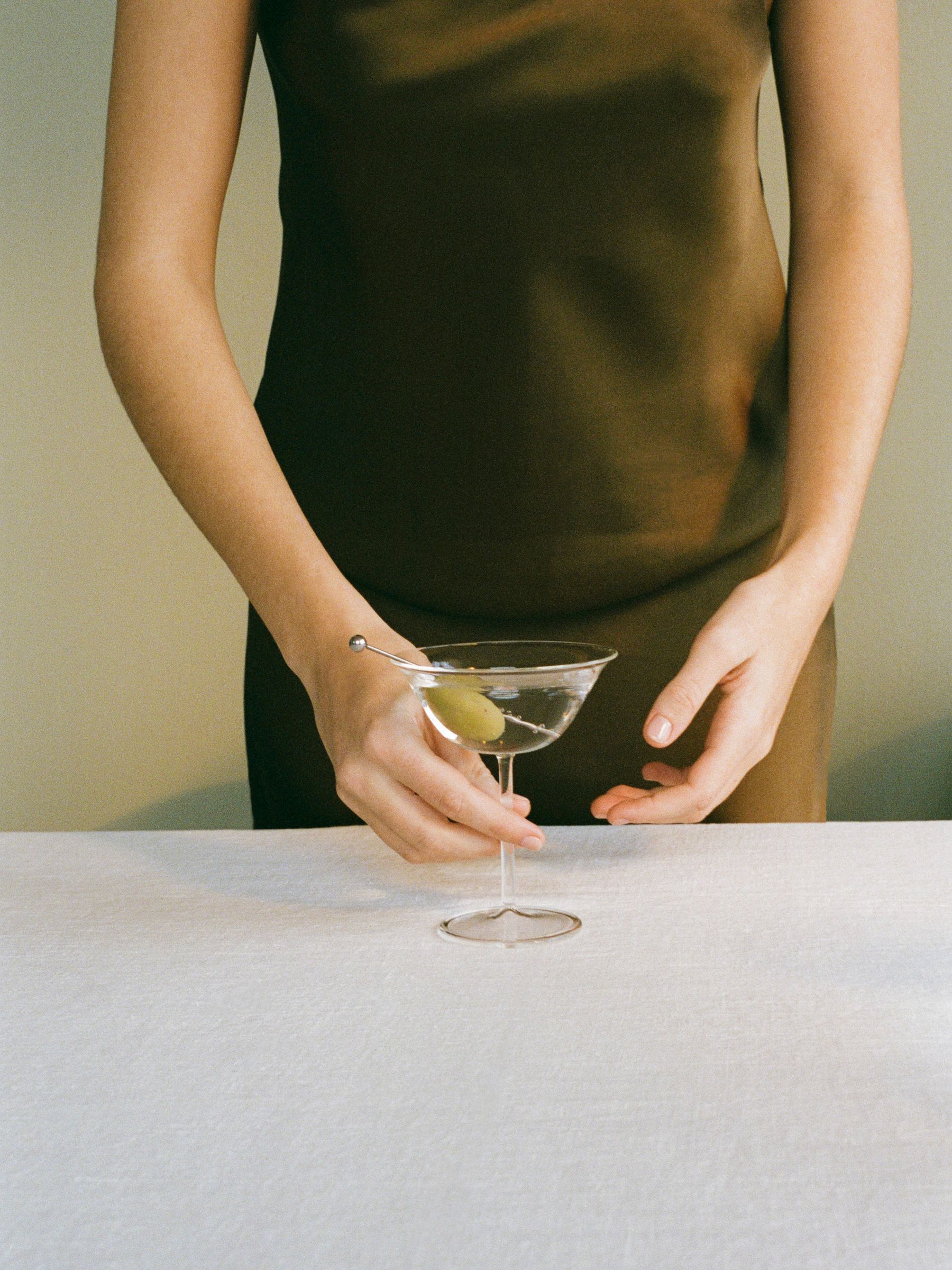 Woman holding Martini glass