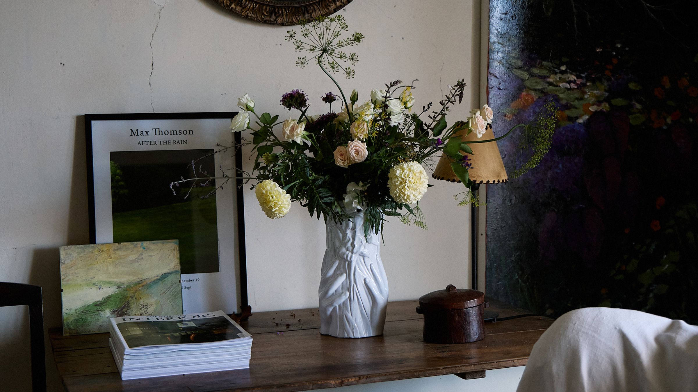 Flowers in Astier de Villatte Vase on Console Table