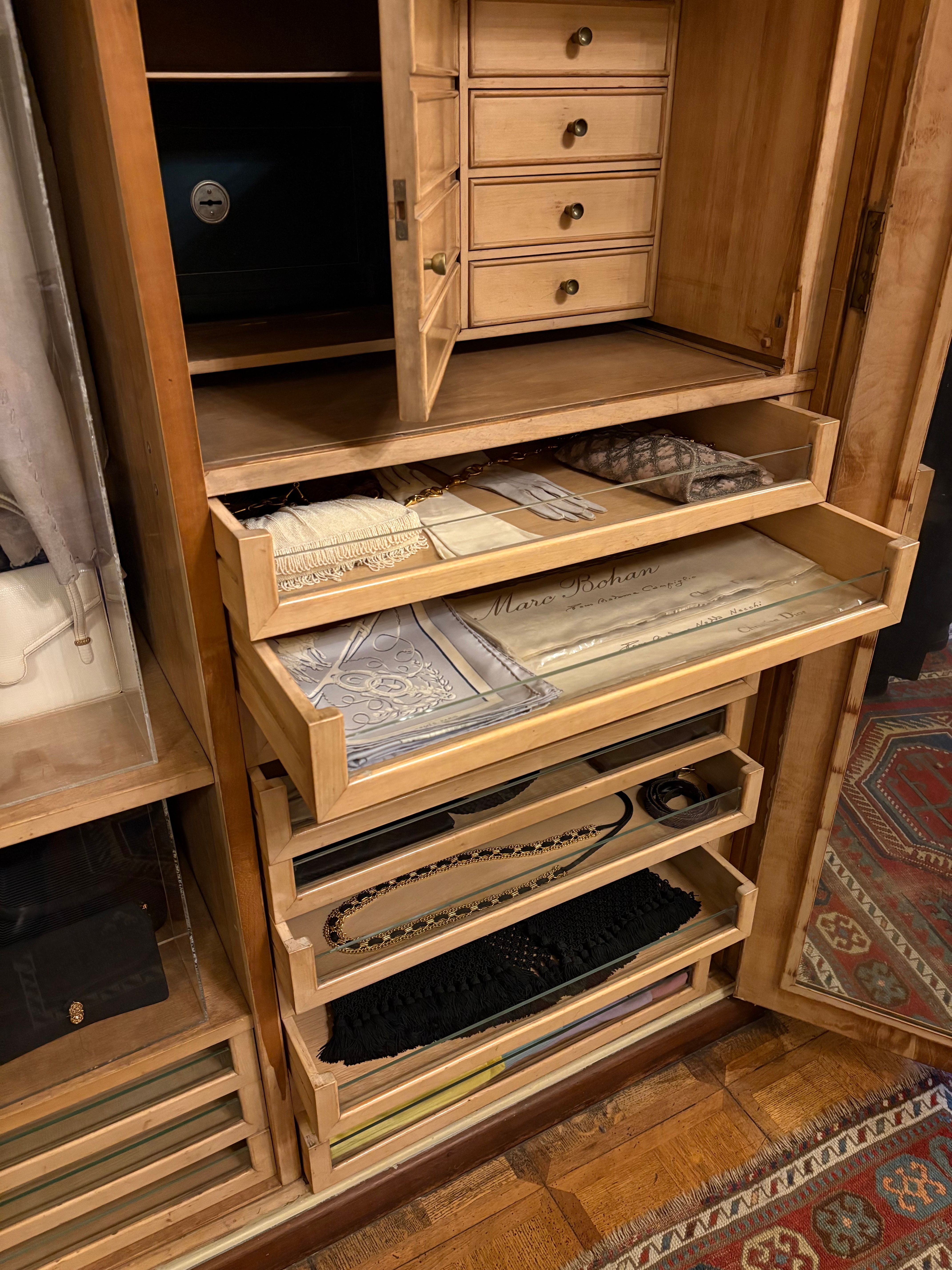 opened drawers feature personal belongings such as scarves