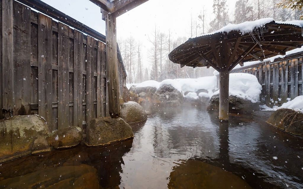 Japanese onsen in the snow