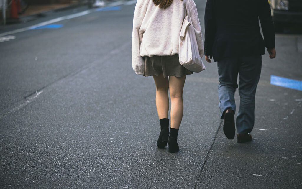 A couple walking on the street