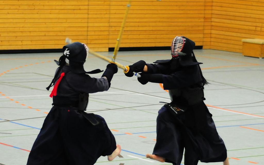 Two kendoka in a shiai kendo match