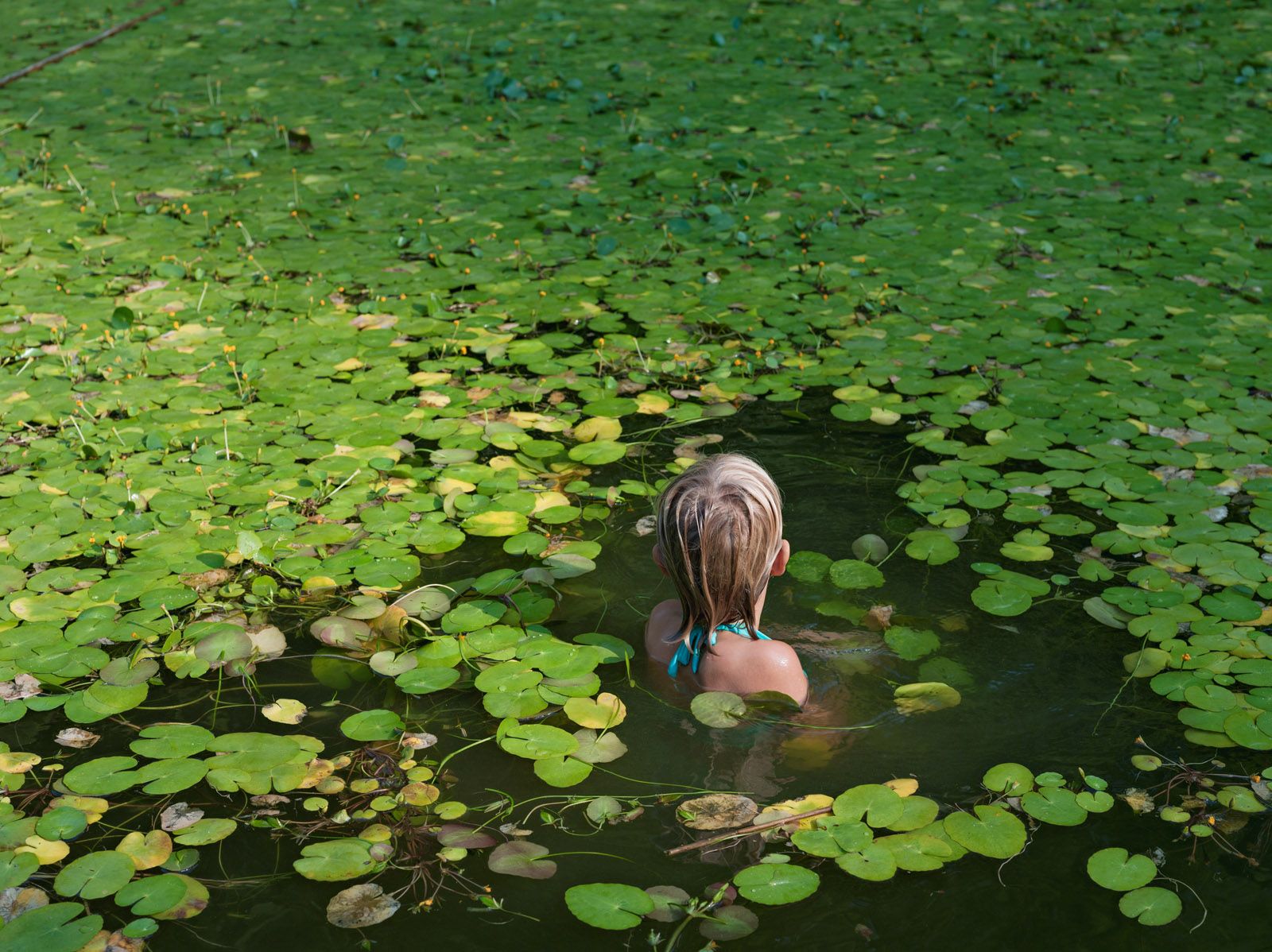 Maddie with Water Lilies, North Carolina 2008